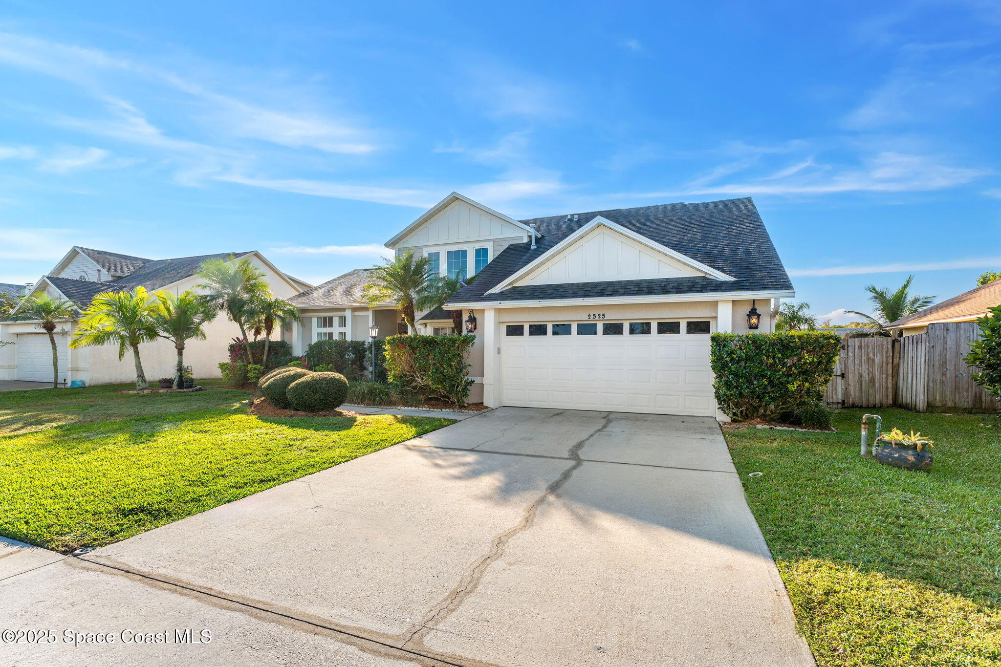 2525 Forest Run Drive Melbourne, FL 32935 - Photo 27 of 36 a view of a house with a yard