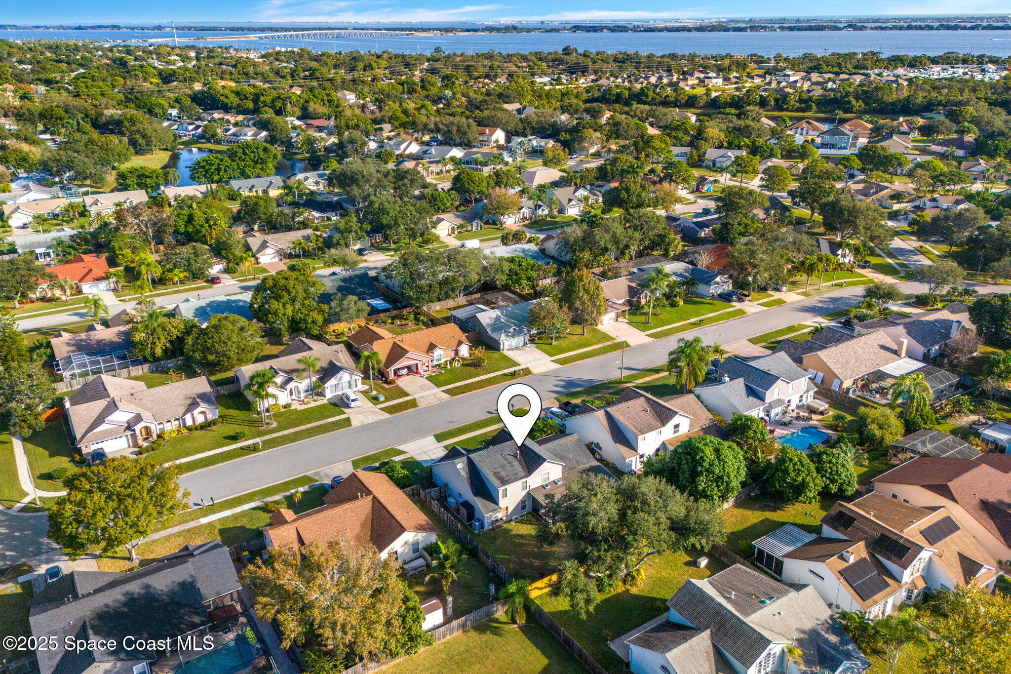 2525 Forest Run Drive Melbourne, FL 32935 - Photo 35 of 36 an aerial view of residential houses with outdoor space