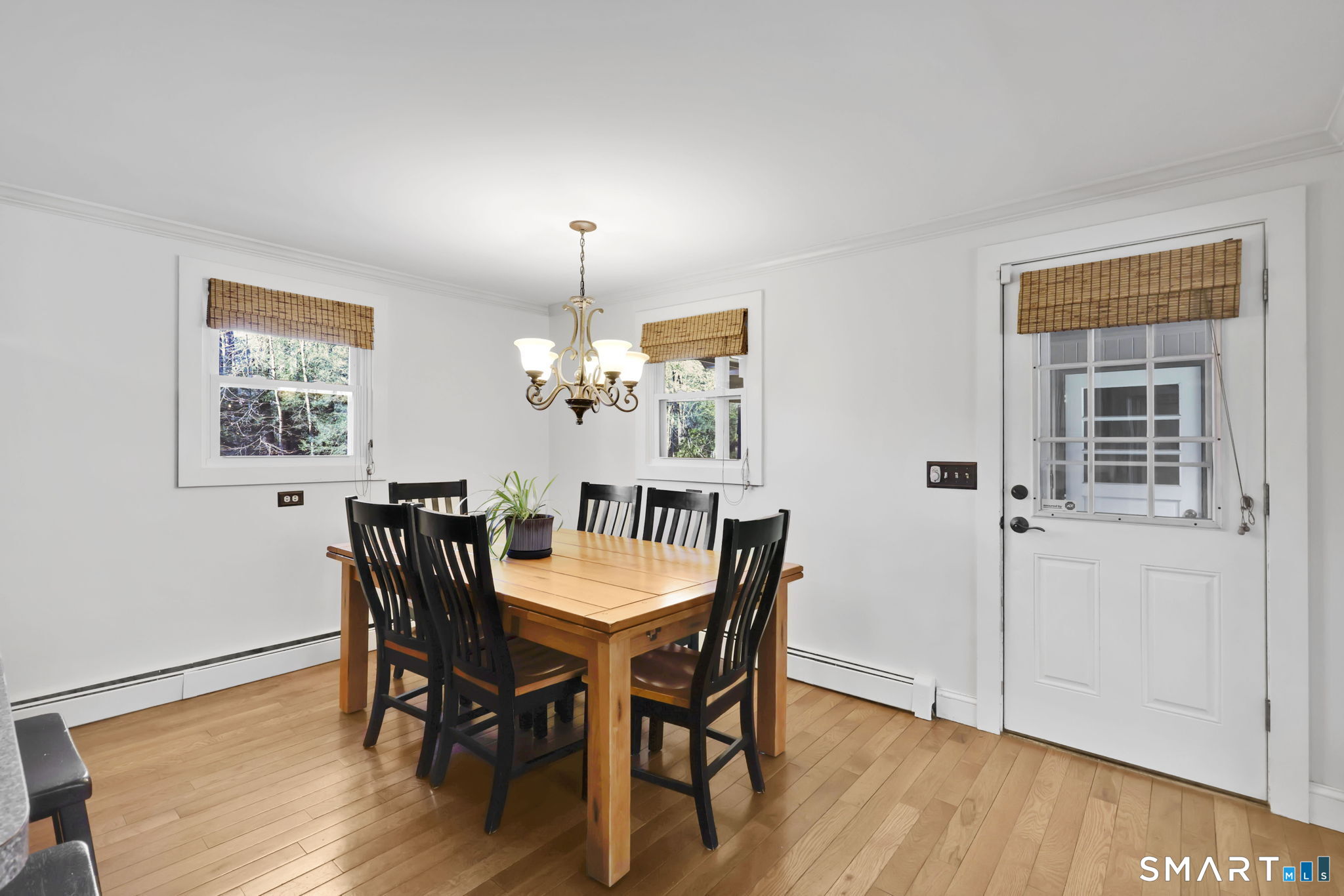 18 Racker Road Stafford, CT 06076 - Photo 11 of 38 a view of a dining room with furniture and wooden floor