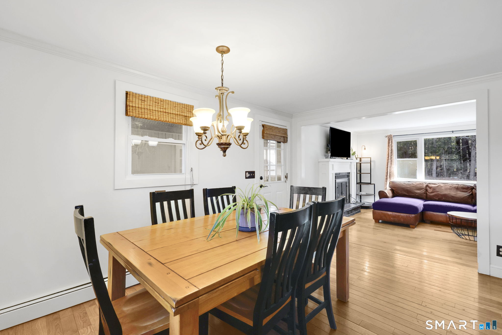 18 Racker Road Stafford, CT 06076 - Photo 12 of 38 a view of a dining room with furniture window and wooden floor