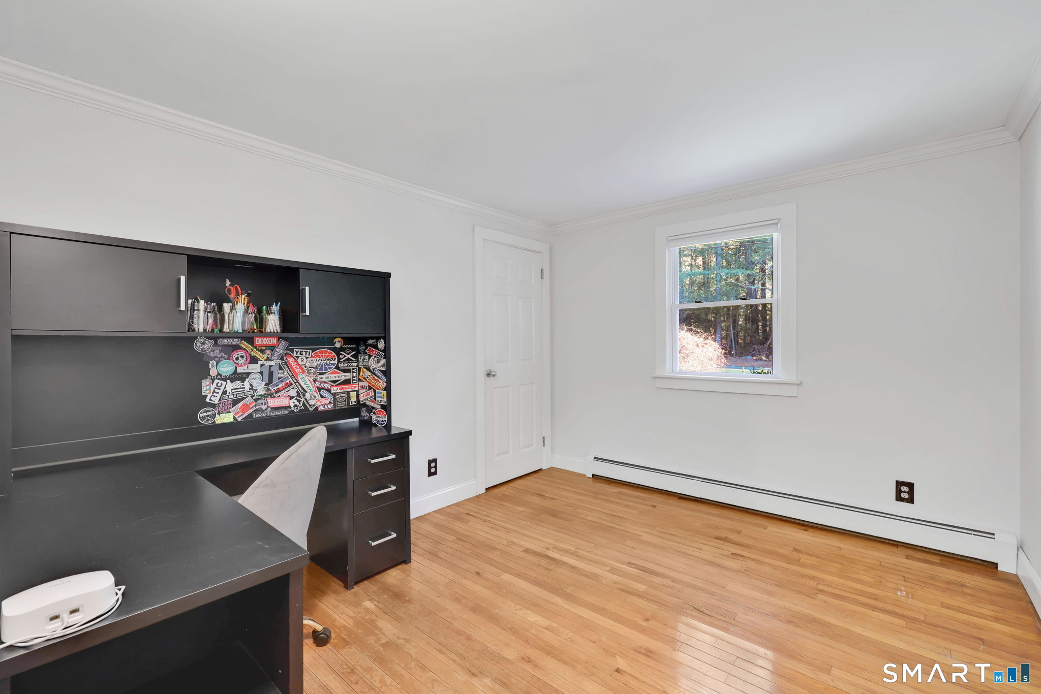 18 Racker Road Stafford, CT 06076 - Photo 15 of 38 a view of room with window and refrigerator