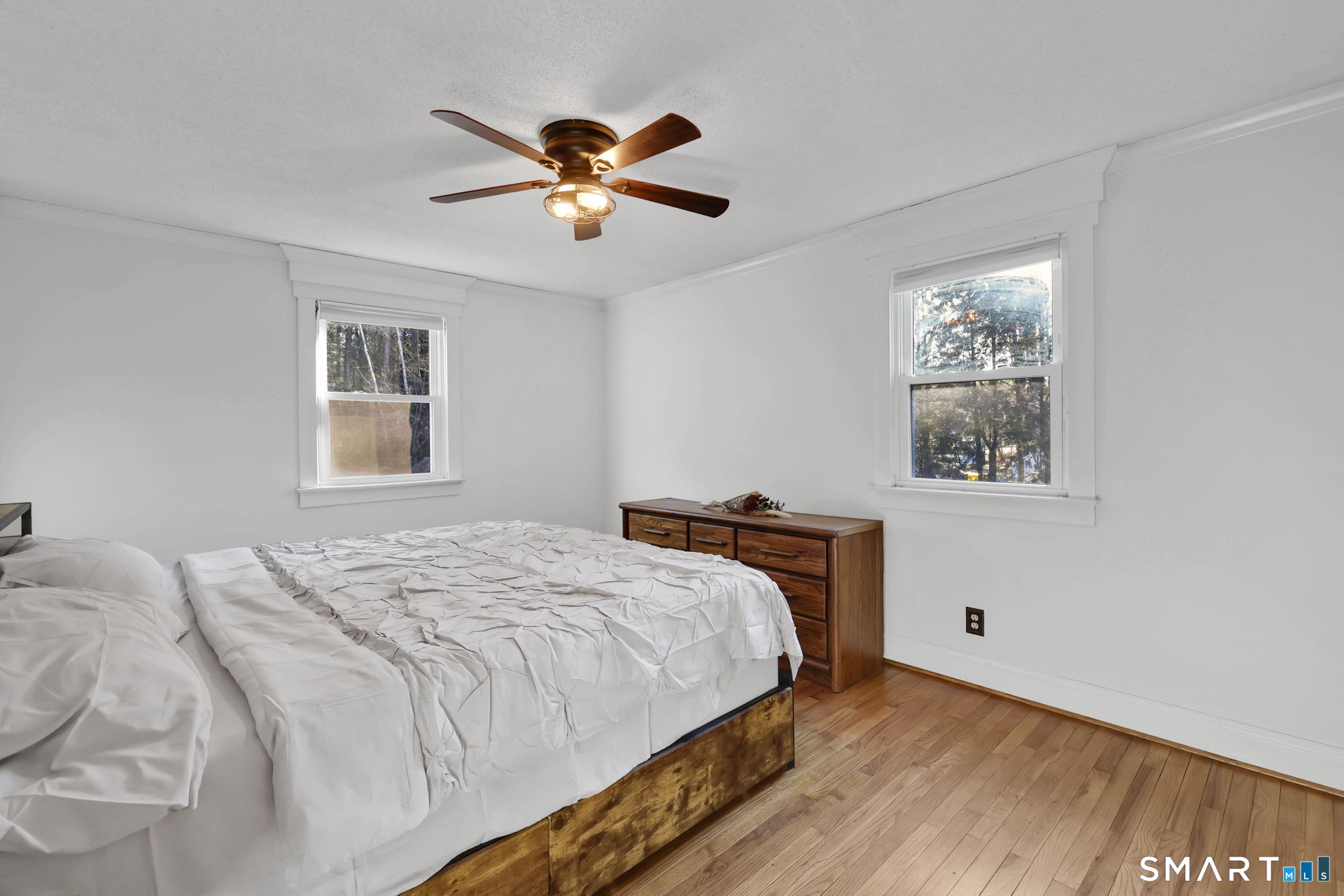 18 Racker Road Stafford, CT 06076 - Photo 19 of 38 a bedroom with a large bed and a window