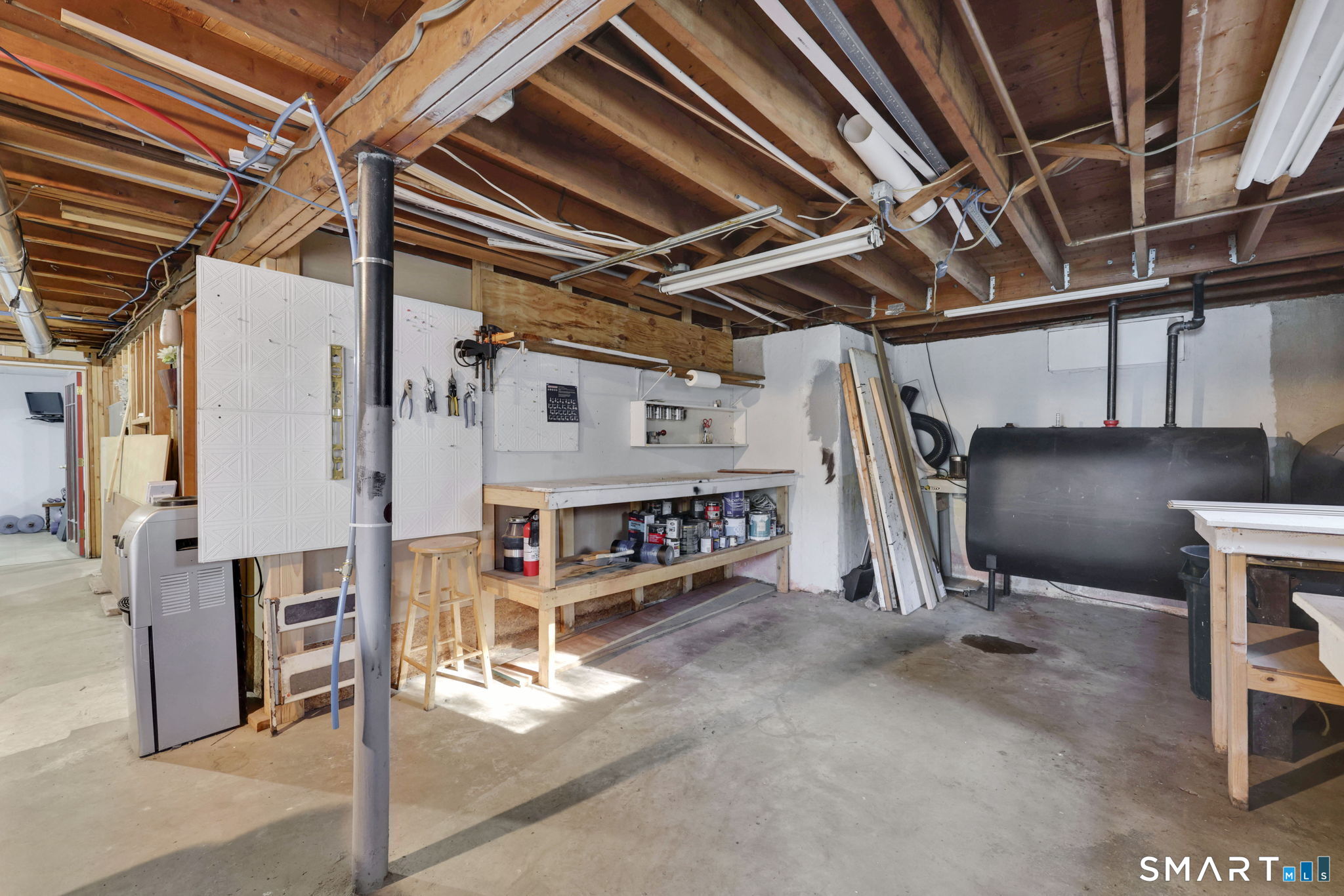 18 Racker Road Stafford, CT 06076 - Photo 24 of 38 a view of an empty room with wooden floor