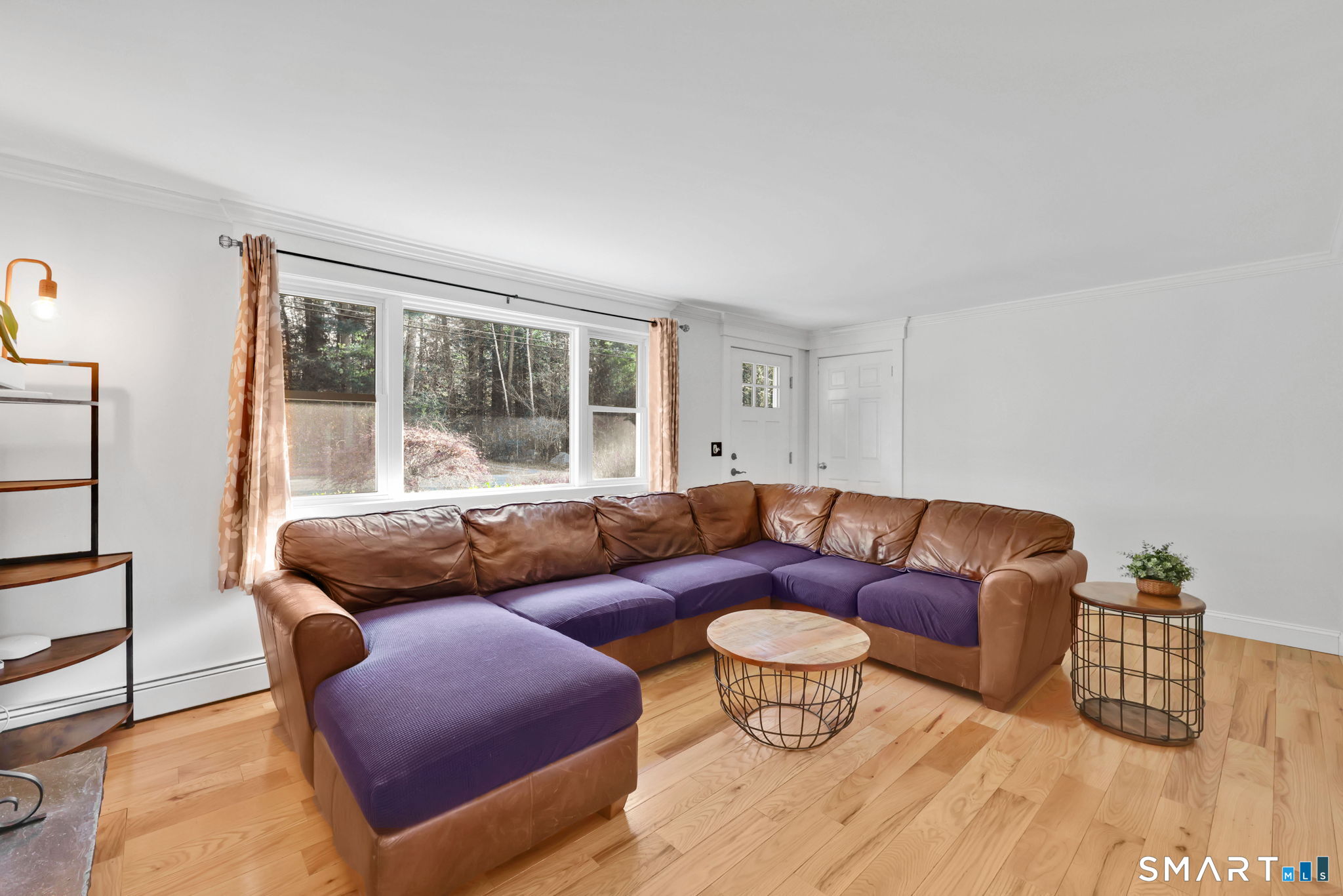 18 Racker Road Stafford, CT 06076 - Photo 3 of 38 a living room with furniture and a window