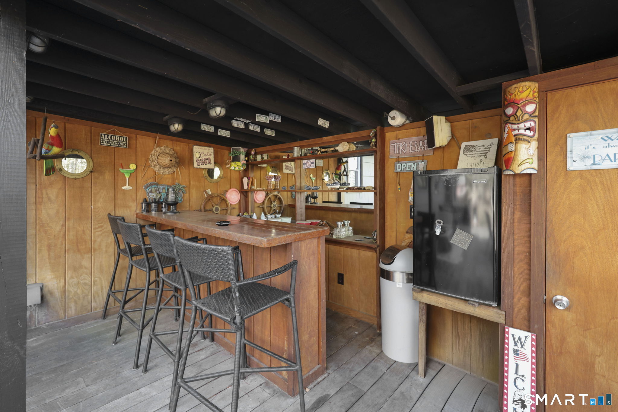 18 Racker Road Stafford, CT 06076 - Photo 31 of 38 a view of a dining room with furniture window and wooden floor
