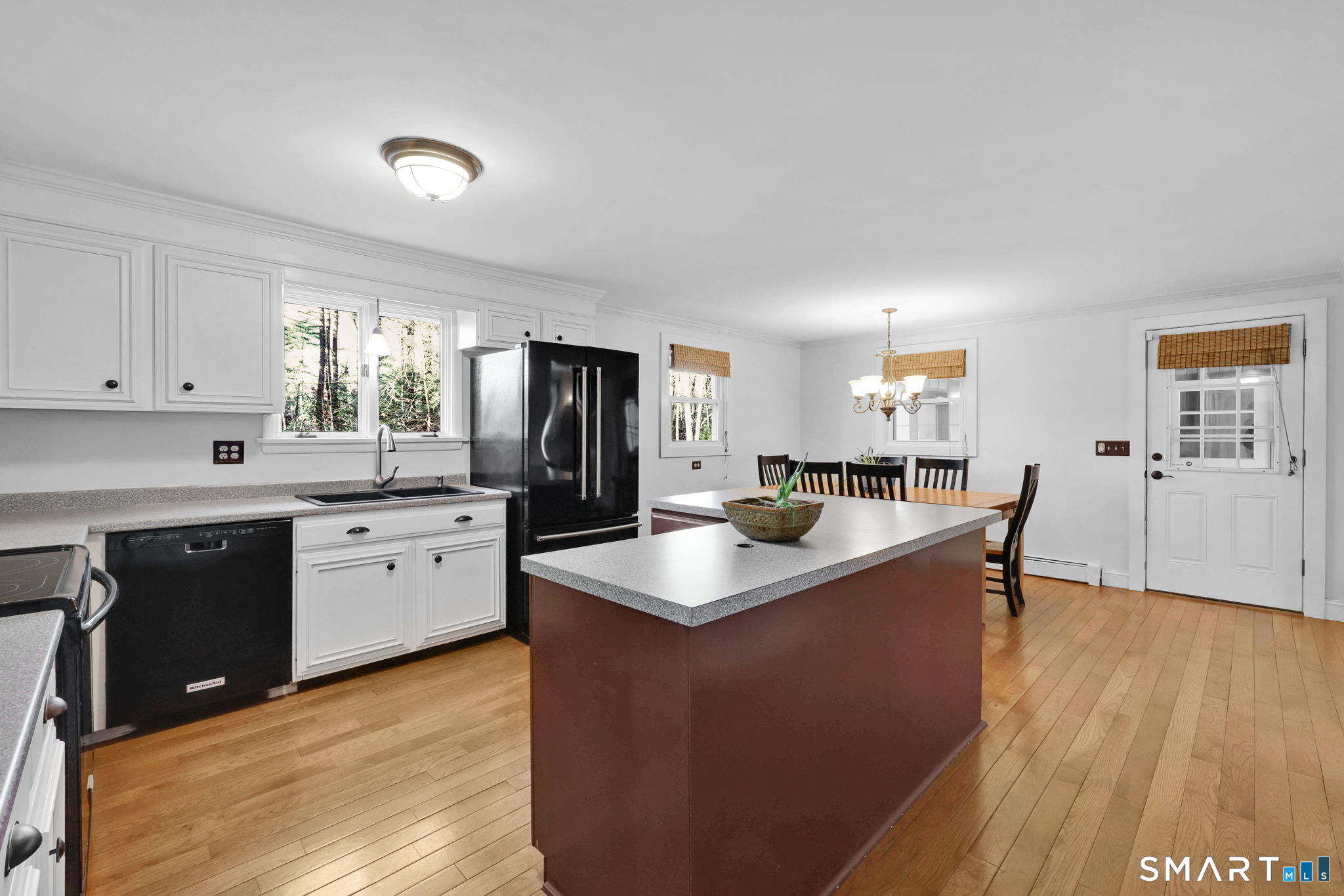 18 Racker Road Stafford, CT 06076 - Photo 7 of 38 a kitchen with stainless steel appliances granite countertop a sink stove and refrigerator