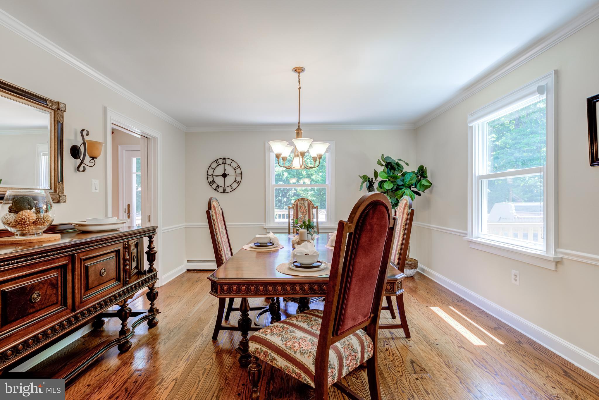 420 Accomac Road Wyncote, PA 19095 - Photo 13 of 82 a view of a dining room with furniture window and wooden floor