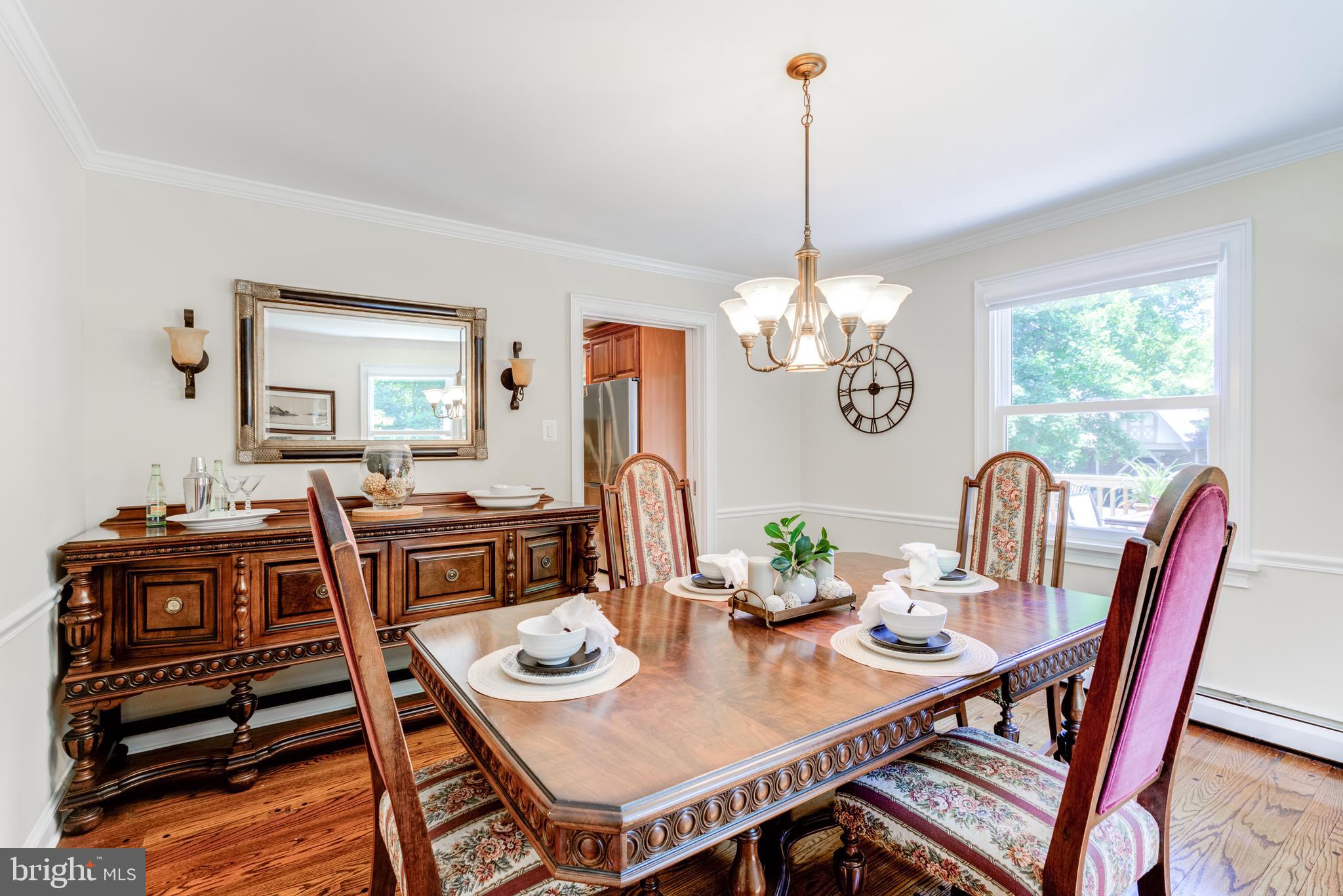 420 Accomac Road Wyncote, PA 19095 - Photo 14 of 82 a view of a dining room with furniture window and wooden floor