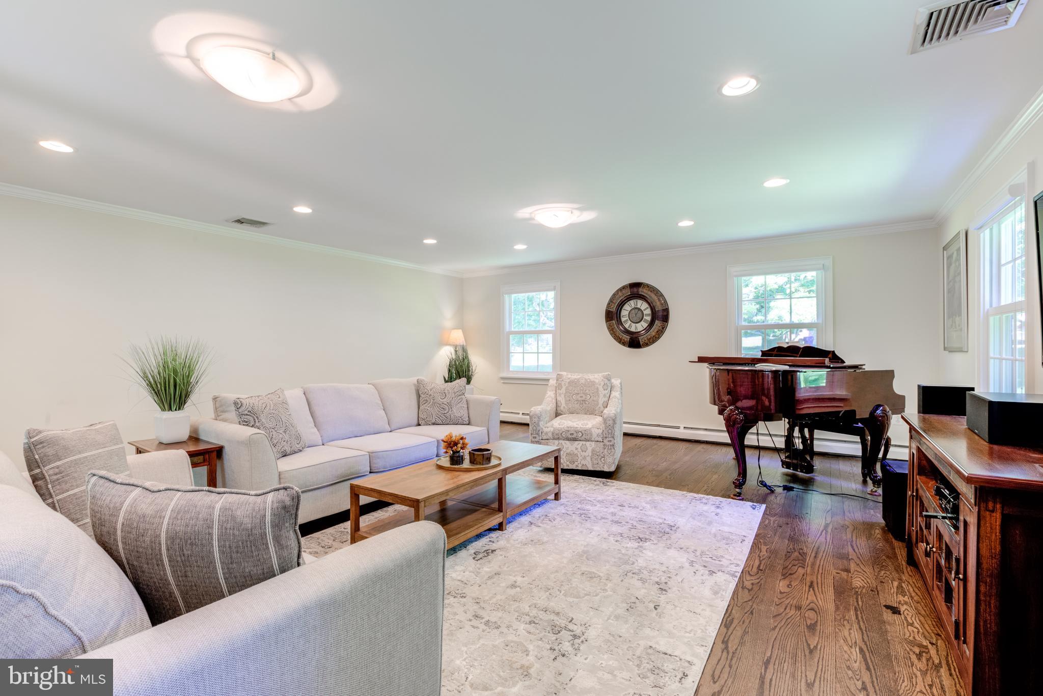 420 Accomac Road Wyncote, PA 19095 - Photo 26 of 82 a living room with furniture and a table