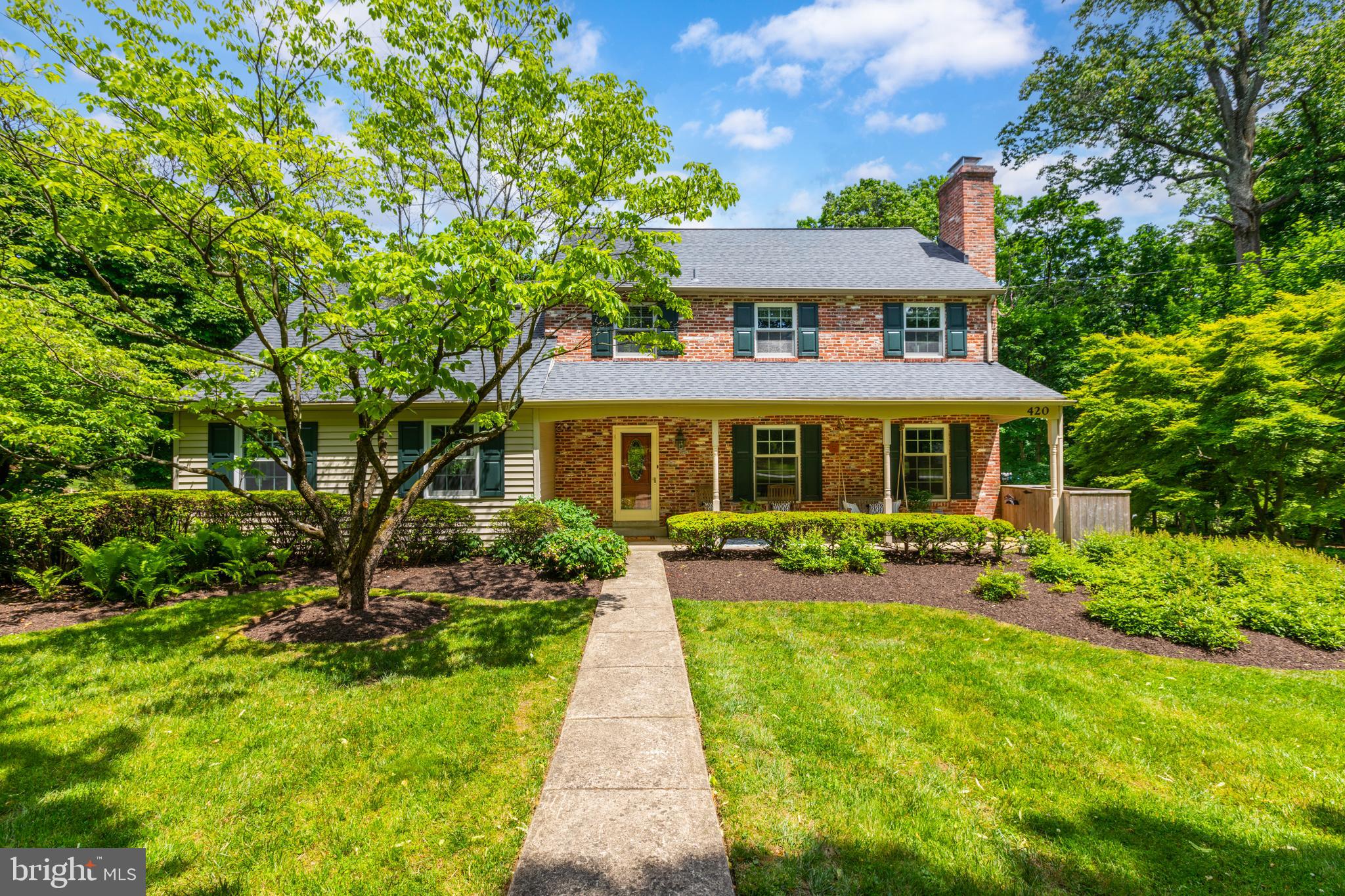 420 Accomac Road Wyncote, PA 19095 - Photo 3 of 82 a front view of a house with yard patio and green space