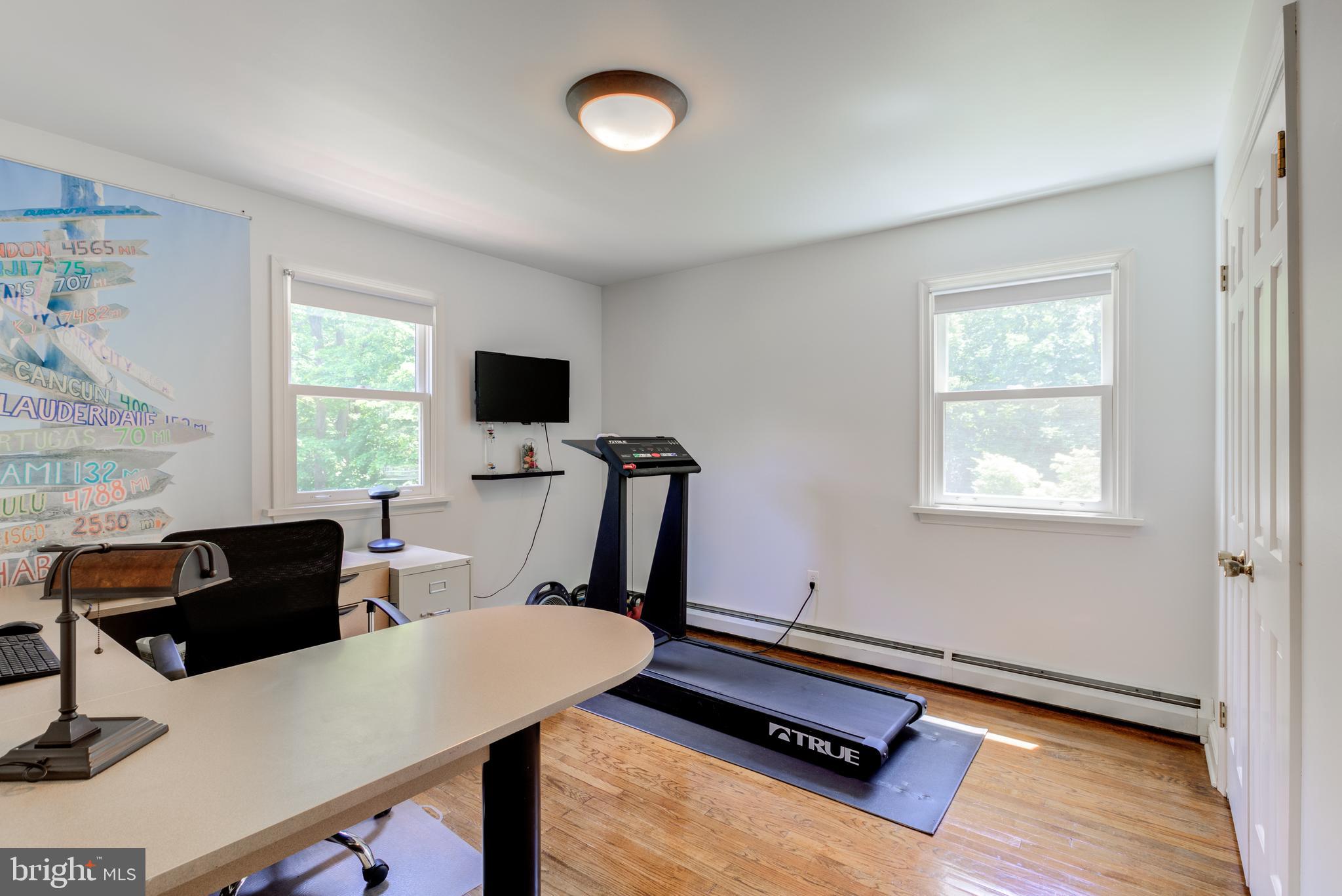 420 Accomac Road Wyncote, PA 19095 - Photo 48 of 82 a view of a workspace with furniture and a window