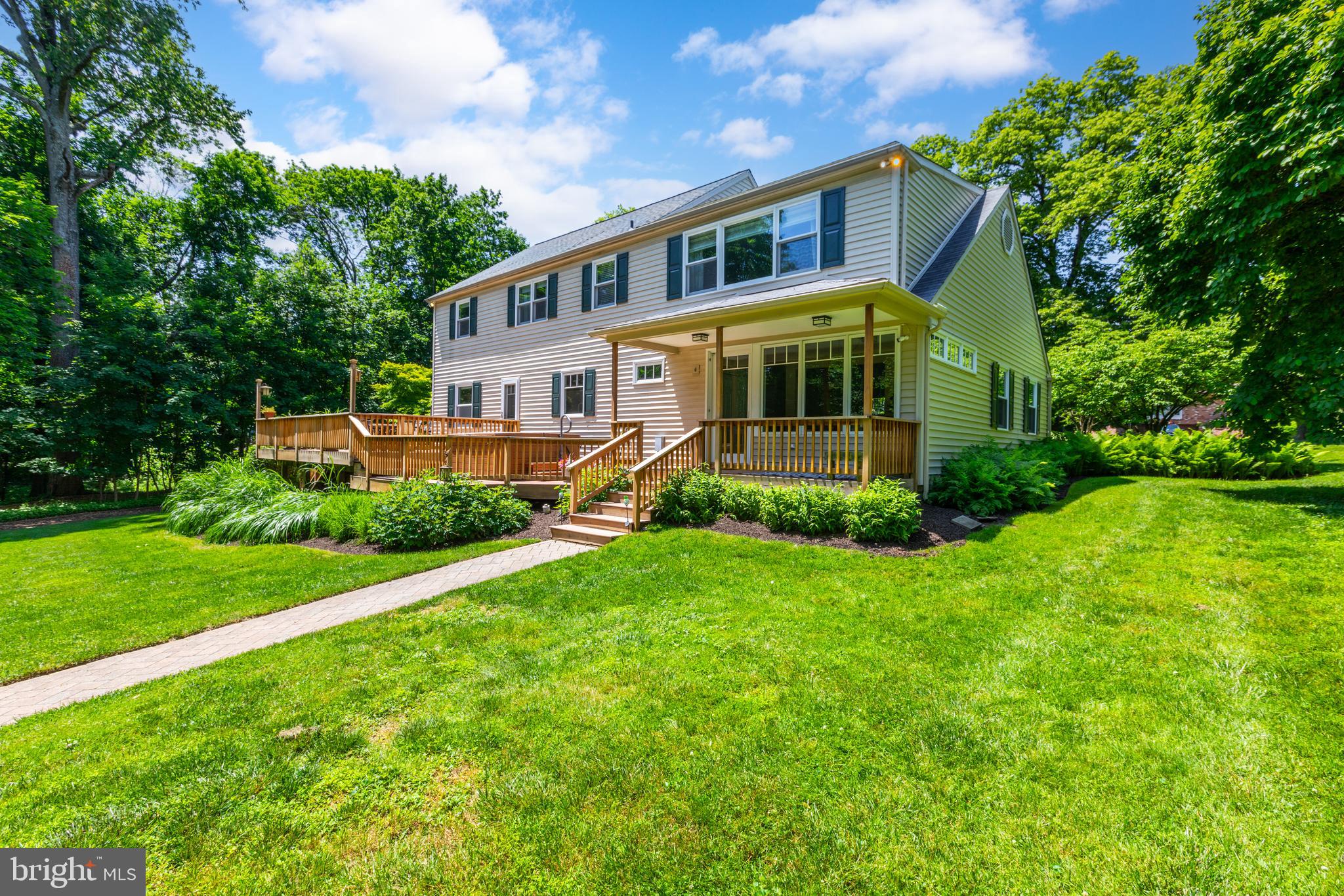 420 Accomac Road Wyncote, PA 19095 - Photo 60 of 82 a front view of house with yard and green space