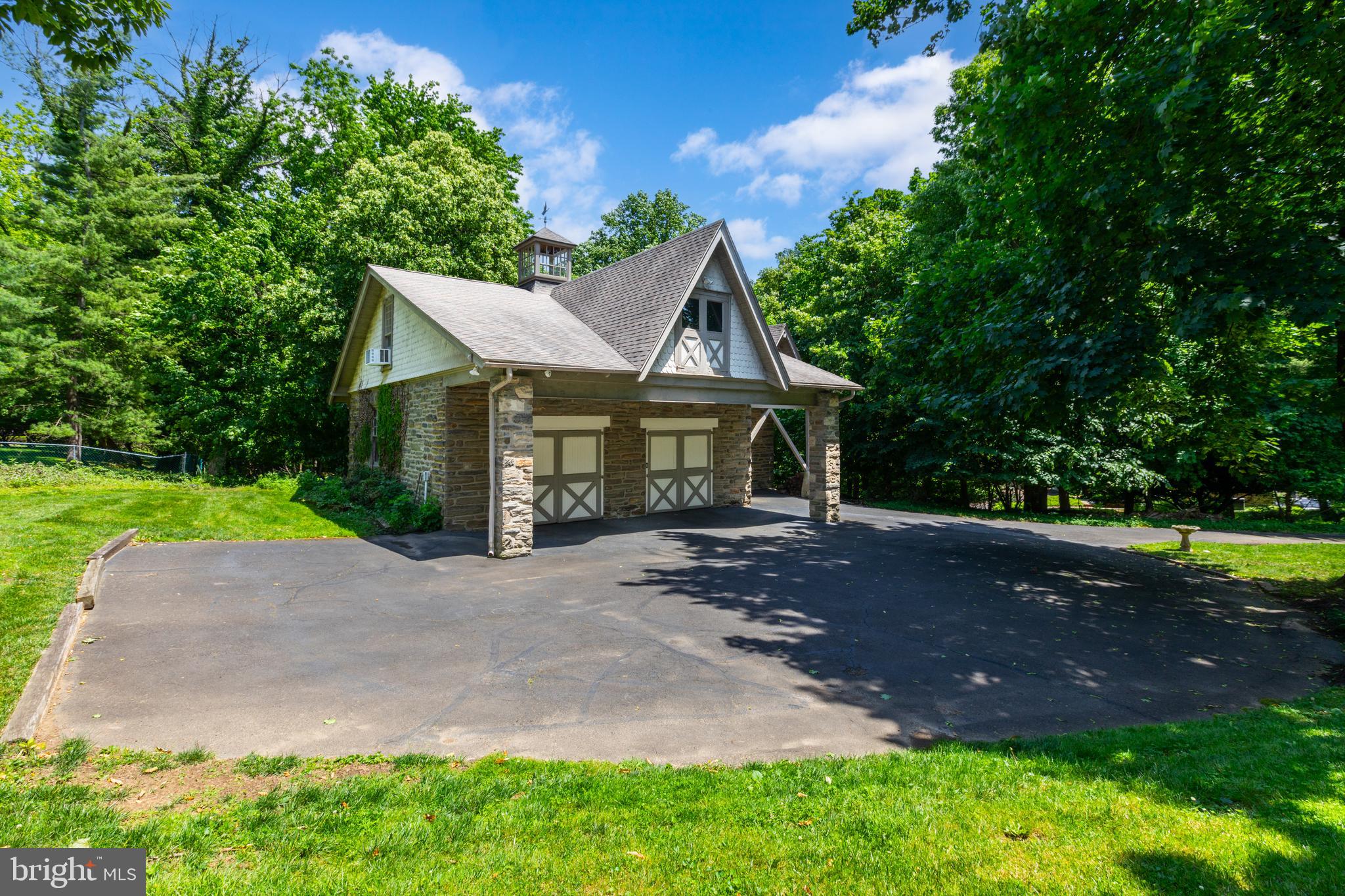 420 Accomac Road Wyncote, PA 19095 - Photo 66 of 82 a view of a house with yard and a garden