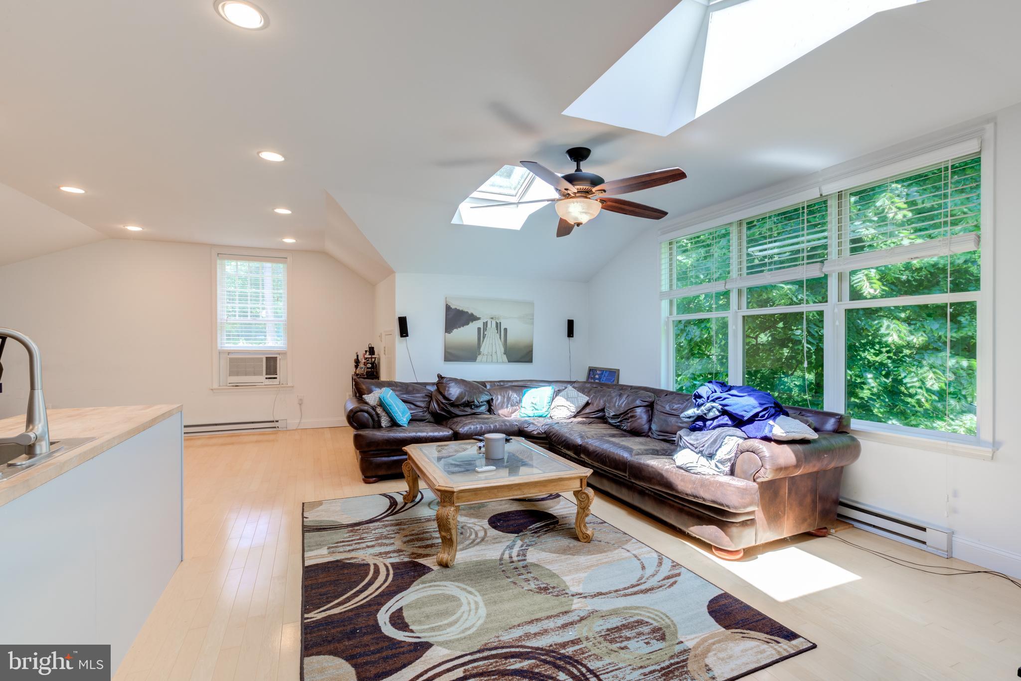420 Accomac Road Wyncote, PA 19095 - Photo 69 of 82 a living room with furniture and a large window