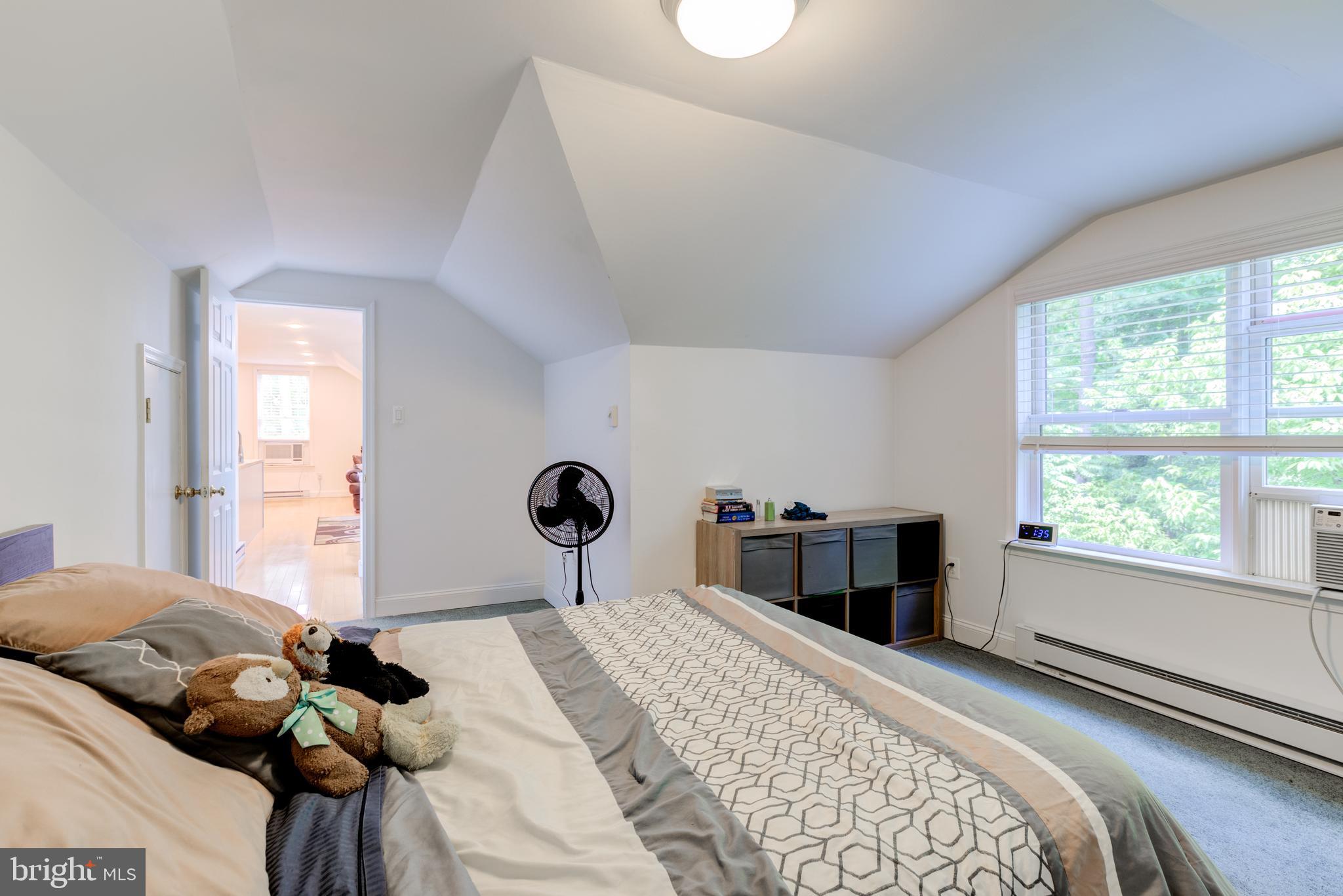 420 Accomac Road Wyncote, PA 19095 - Photo 79 of 82 a bedroom with a bed and a window