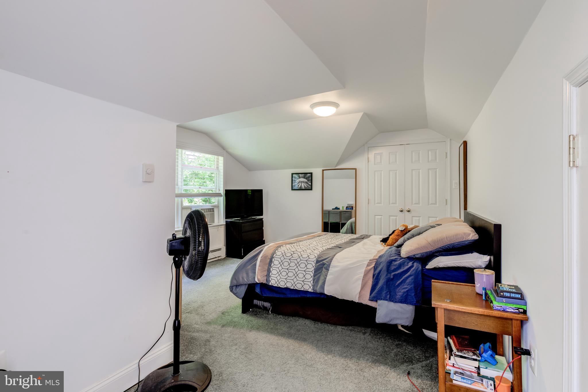 420 Accomac Road Wyncote, PA 19095 - Photo 80 of 82 a bedroom with a bed and a closet