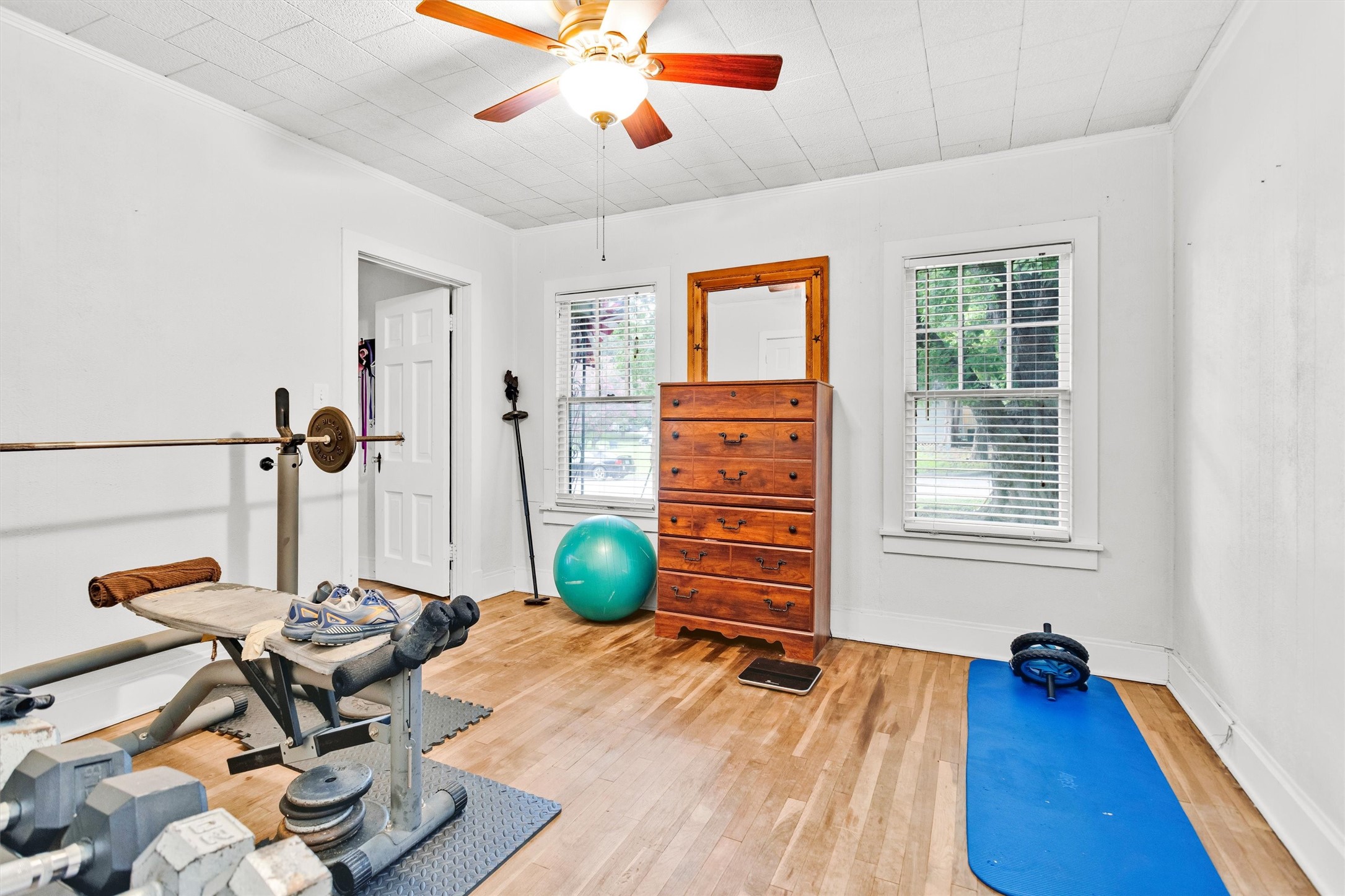 1720 18th Street Huntsville, TX 77340 - Photo 22 of 37 a view of a workspace with furniture and a window
