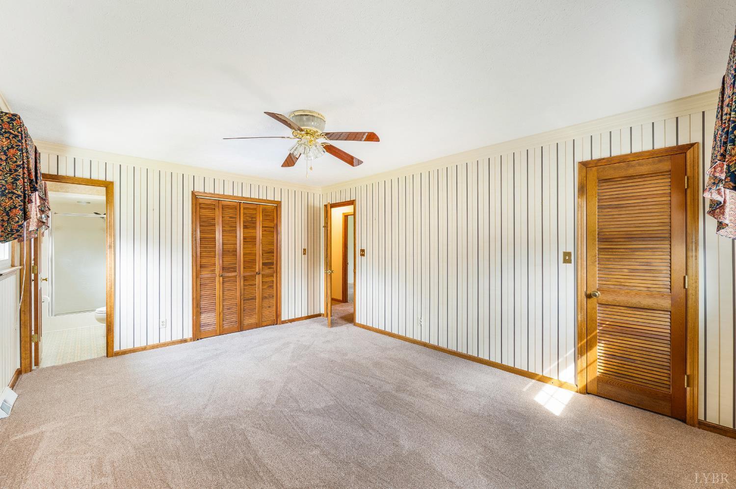 129 Quail Ridge Drive Altavista, VA 24517 - Photo 20 of 76 a view of a livingroom with a ceiling fan and window