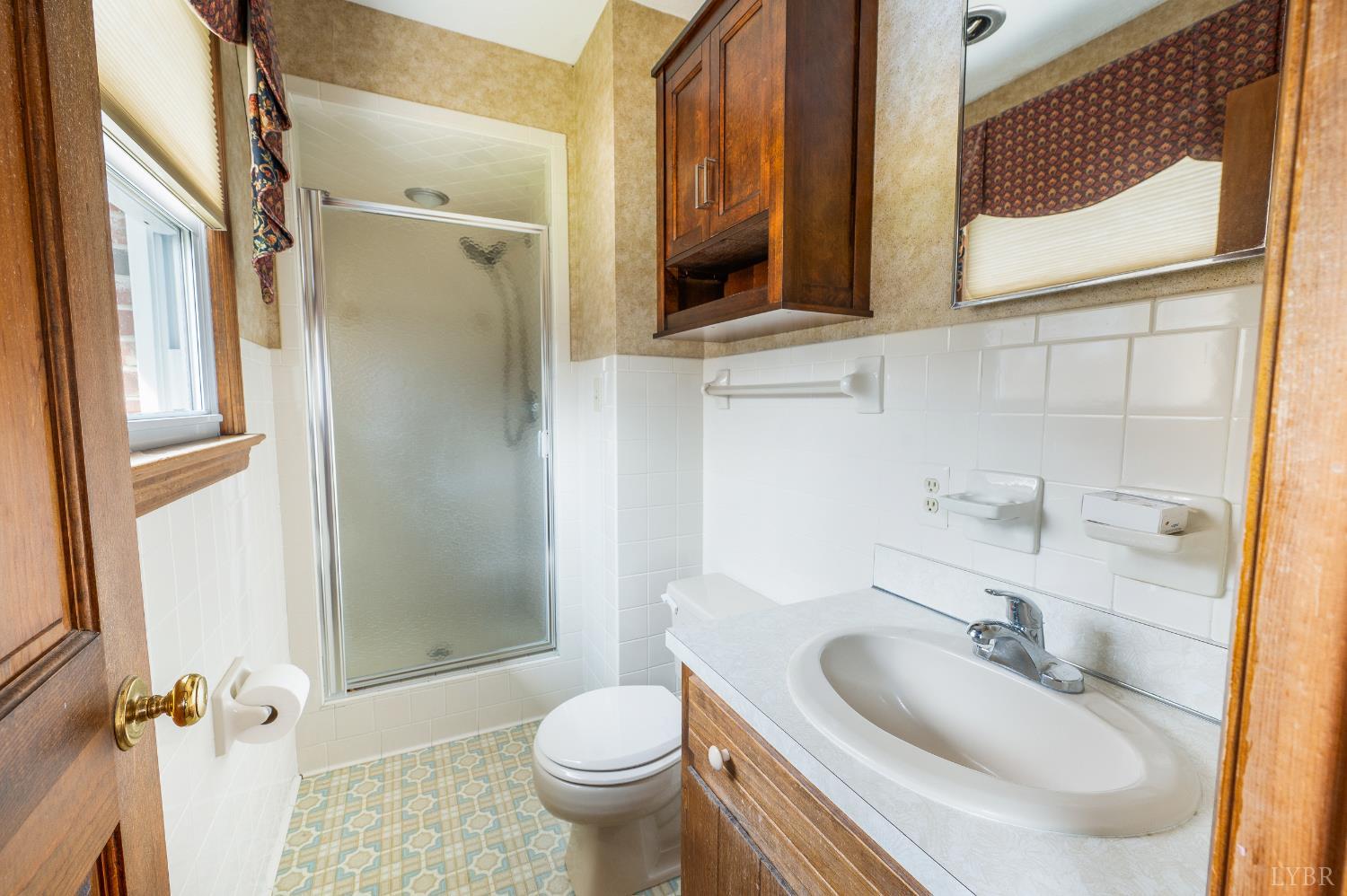 129 Quail Ridge Drive Altavista, VA 24517 - Photo 22 of 76 a bathroom with a sink toilet and shower