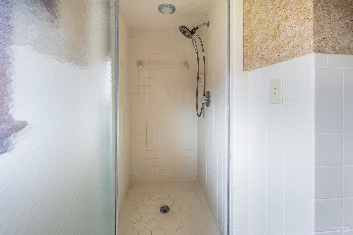 129 Quail Ridge Drive Altavista, VA 24517 - Photo 23 of 76 a bathroom with a shower