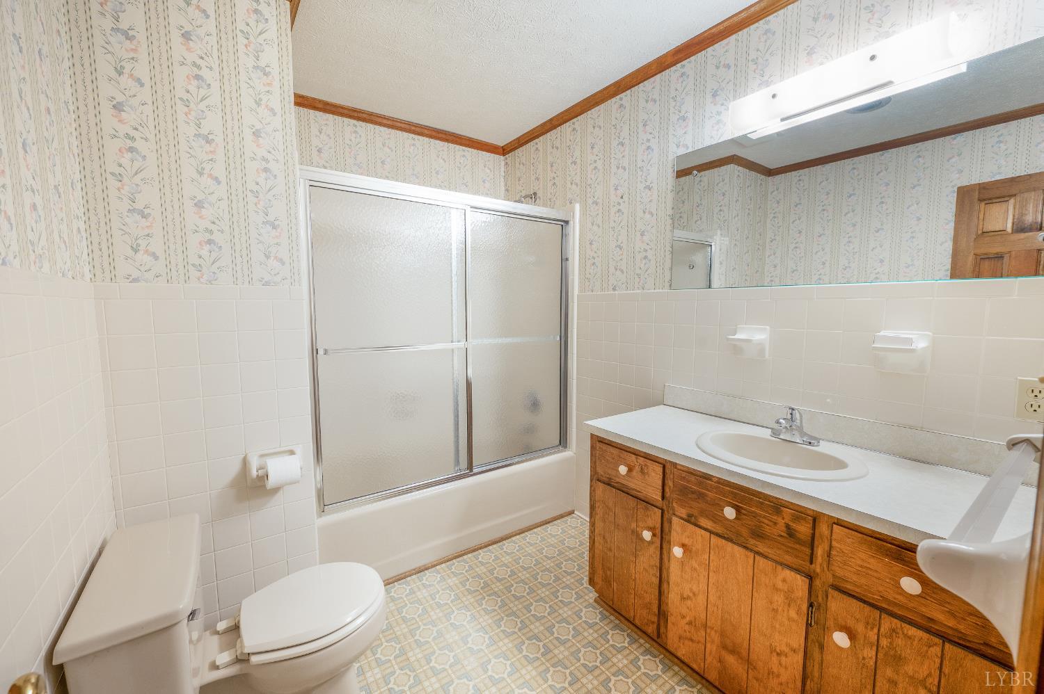 129 Quail Ridge Drive Altavista, VA 24517 - Photo 26 of 76 a bathroom with a sink a toilet and shower