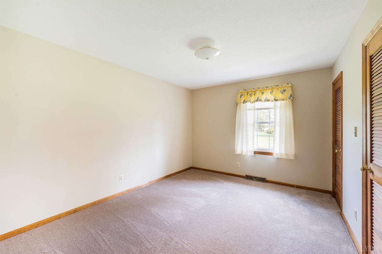 129 Quail Ridge Drive Altavista, VA 24517 - Photo 27 of 76 an empty room with windows