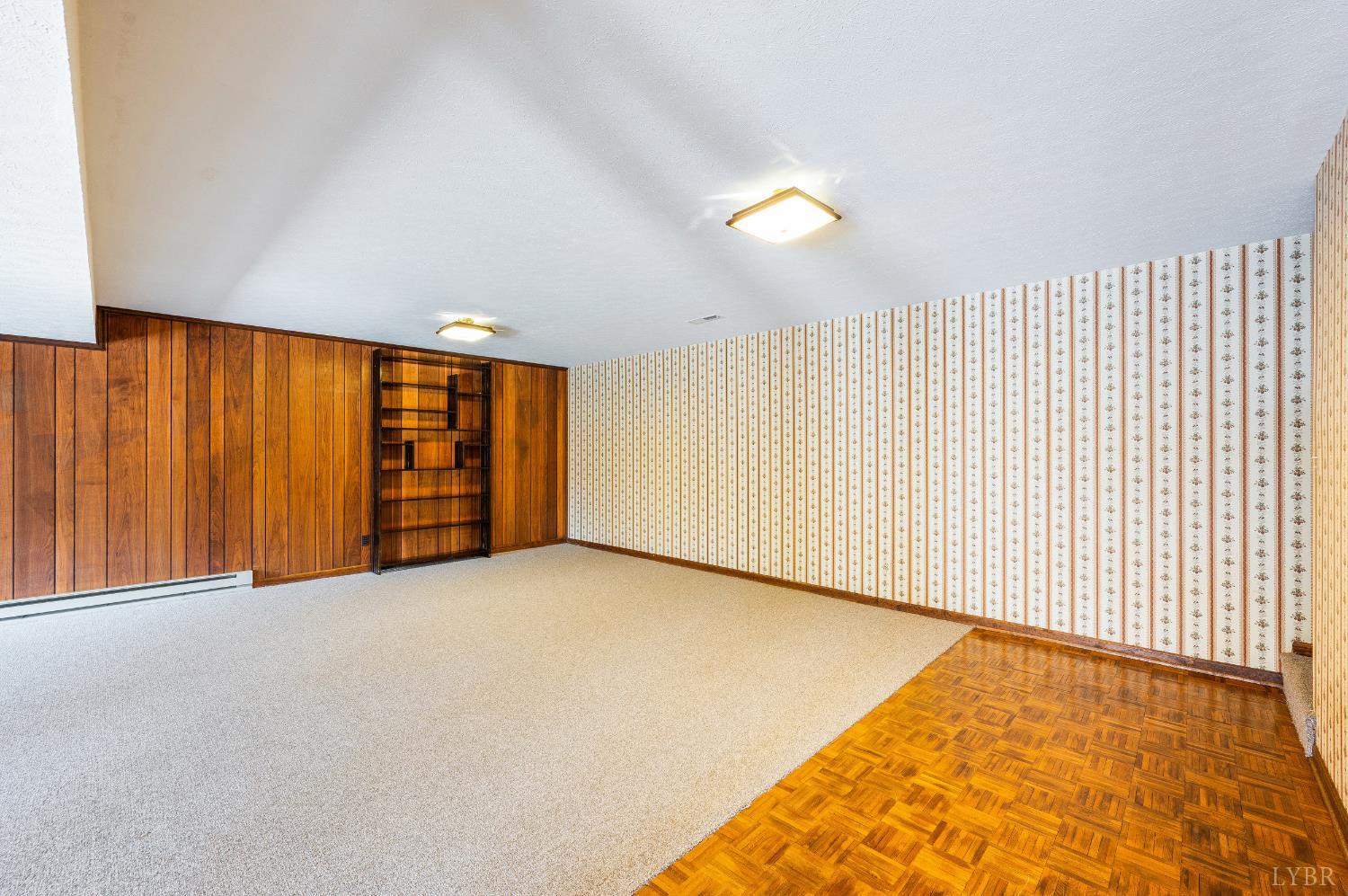 129 Quail Ridge Drive Altavista, VA 24517 - Photo 36 of 76 a view of an empty room with wooden floor