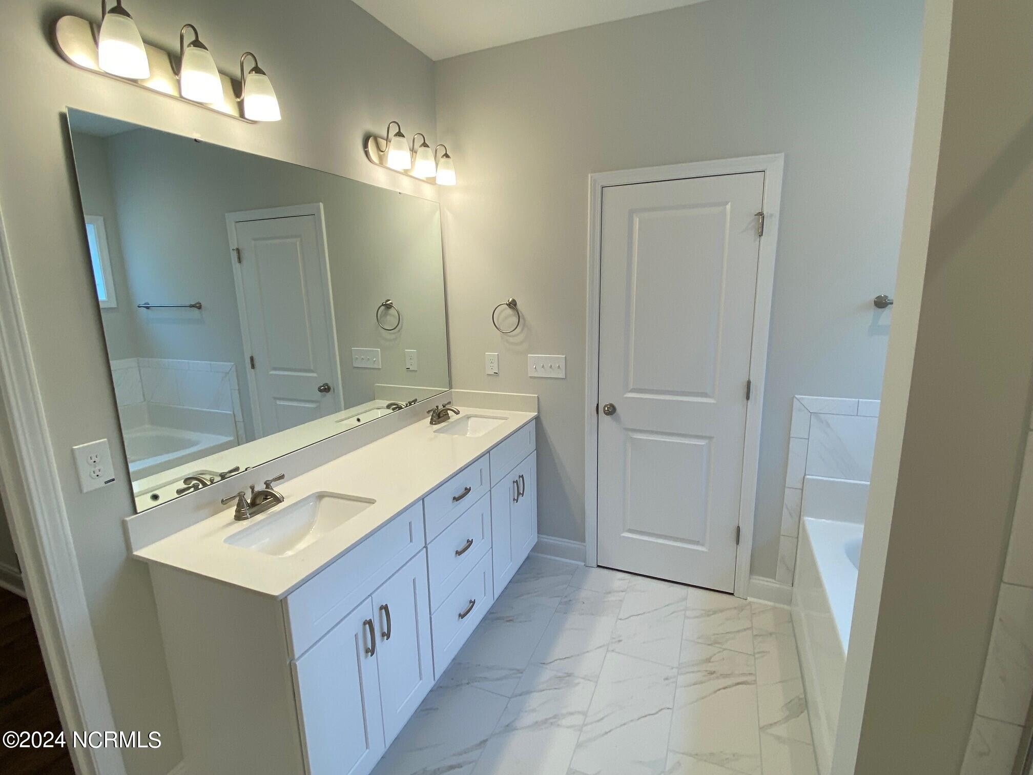 197 Longleaf Drive West End, NC 27376 - Photo 11 of 31 final primary bath 2