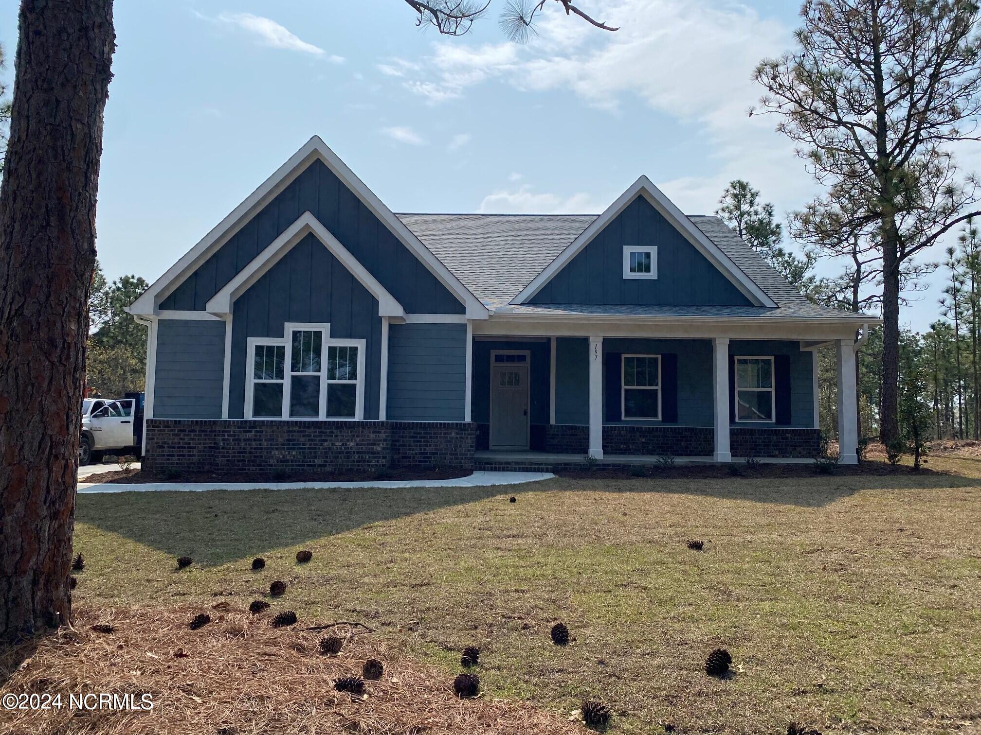 197 Longleaf Drive West End, NC 27376 - Photo 2 of 31 final front