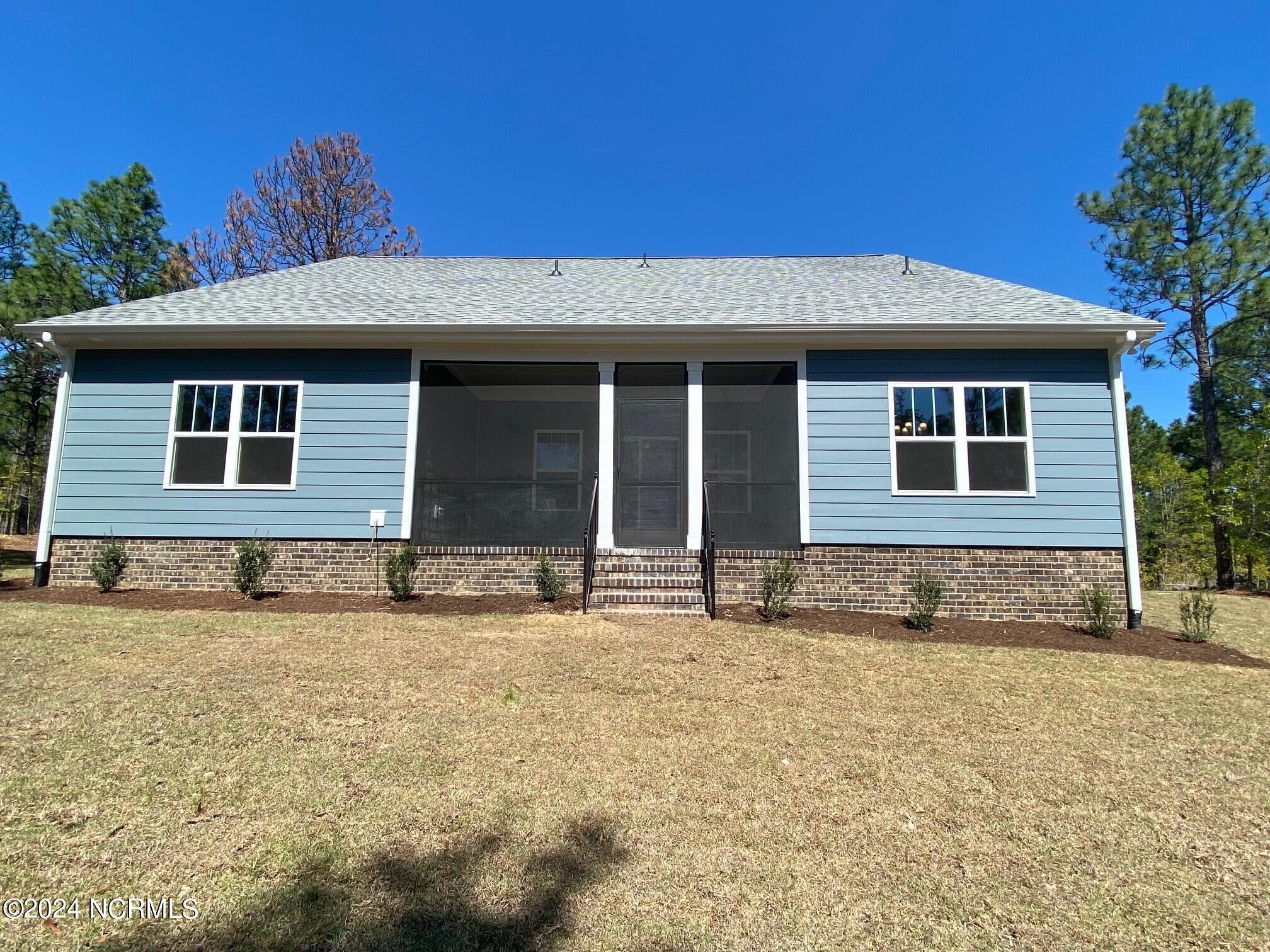 197 Longleaf Drive West End, NC 27376 - Photo 3 of 31 final rear