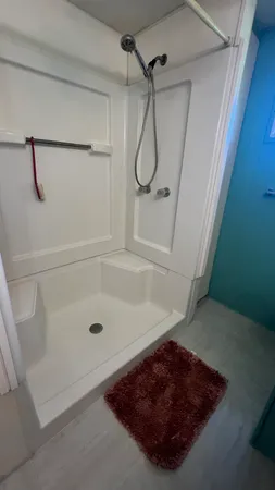a bathroom with a bath tub