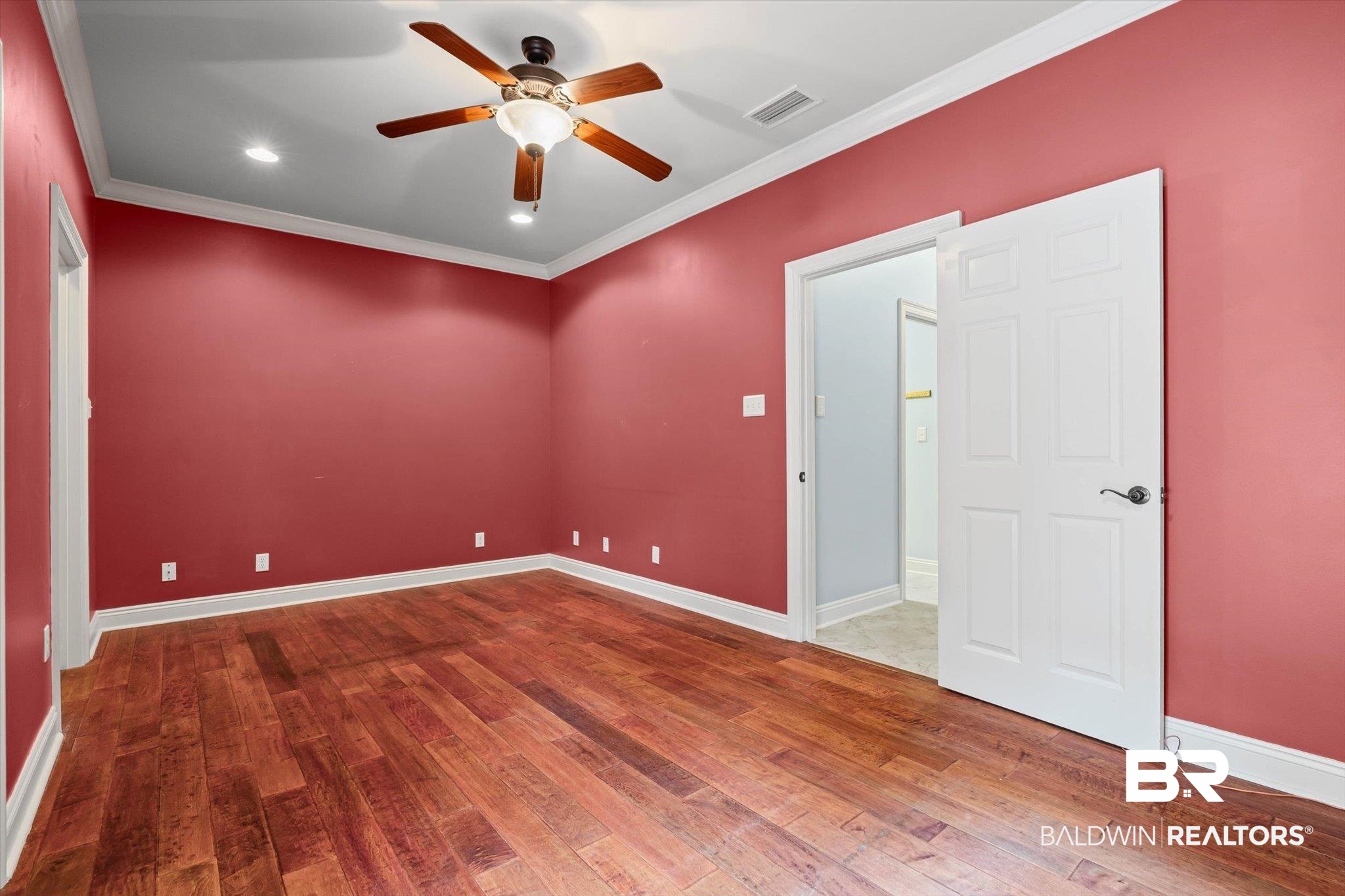 5270 Rodgers Road Eight Mile, AL 36613 - Photo 20 of 38 Empty room with crown molding, light wood finished floors, recessed lighting, and a ceiling fan