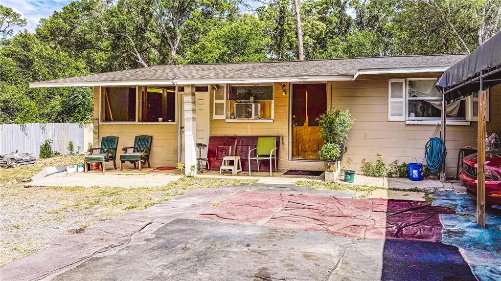 6722 Southwest 53rd Avenue Gainesville, FL 32608 - Photo 2 of 5 a view of a house with a patio