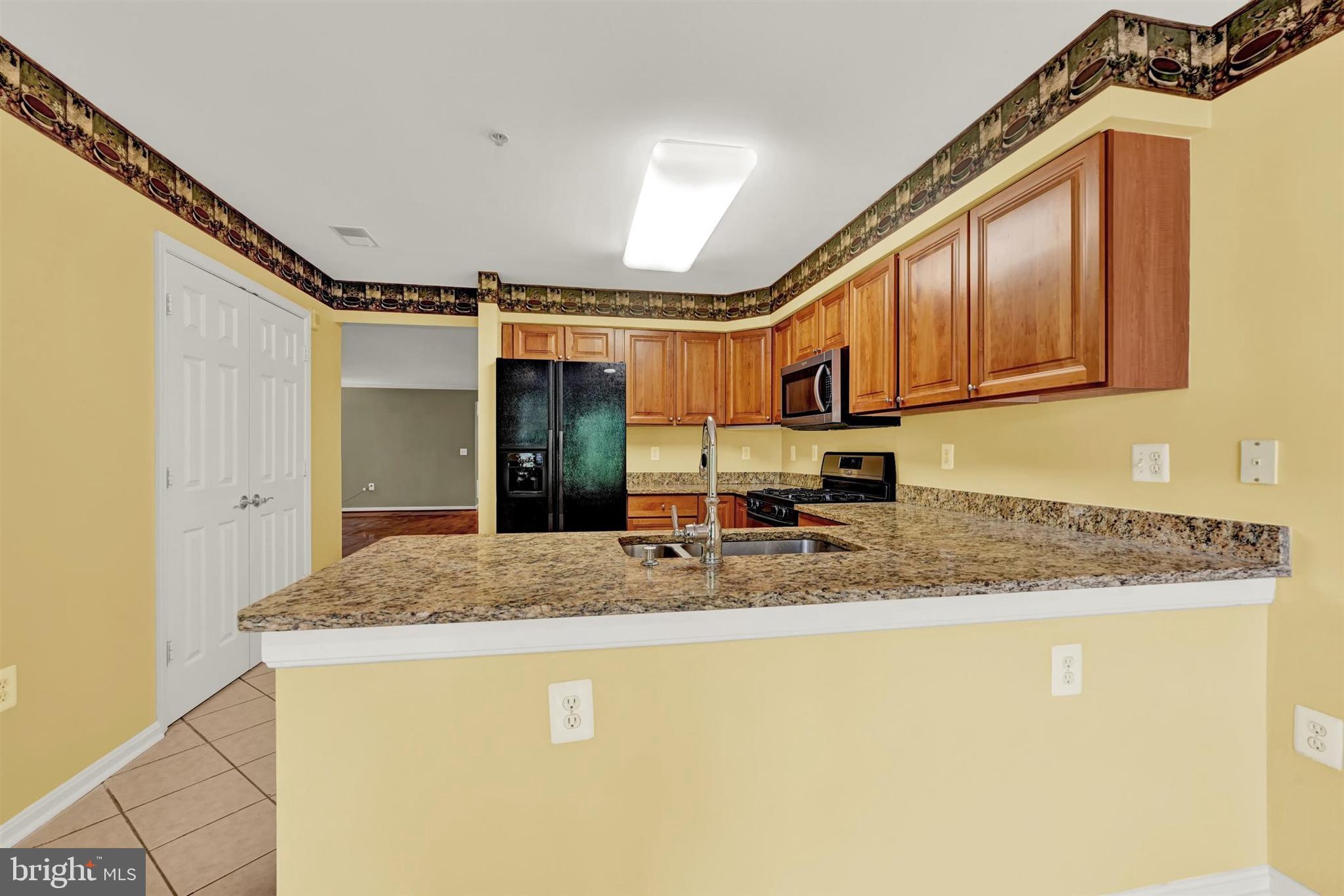 12021 Tralee Road, Unit 402 Lutherville-Timonium, MD 21093 - Photo 16 of 36 Kitchen