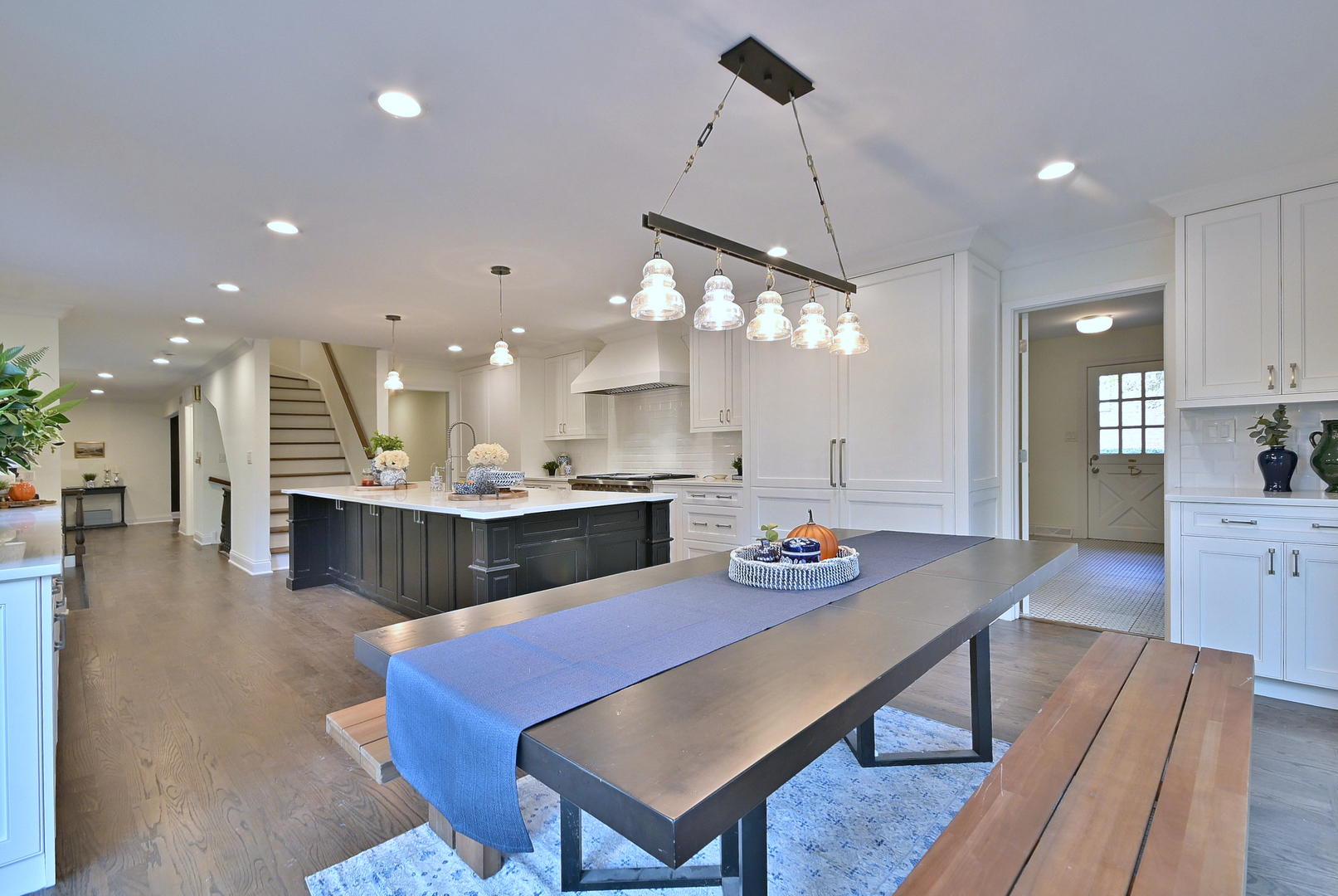 13 Woodgate Drive Burr Ridge, IL 60527 - Photo 15 of 46 a kitchen with a dining table chairs and kitchen view