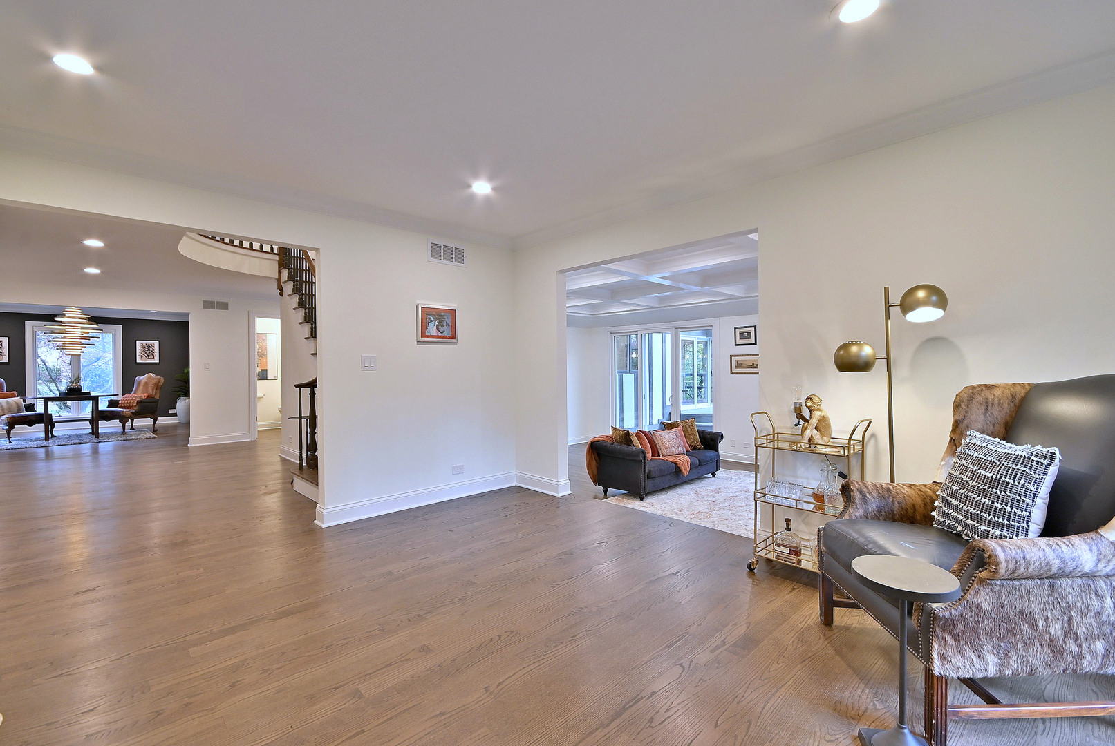 13 Woodgate Drive Burr Ridge, IL 60527 - Photo 24 of 46 a living room with furniture and a wooden floor