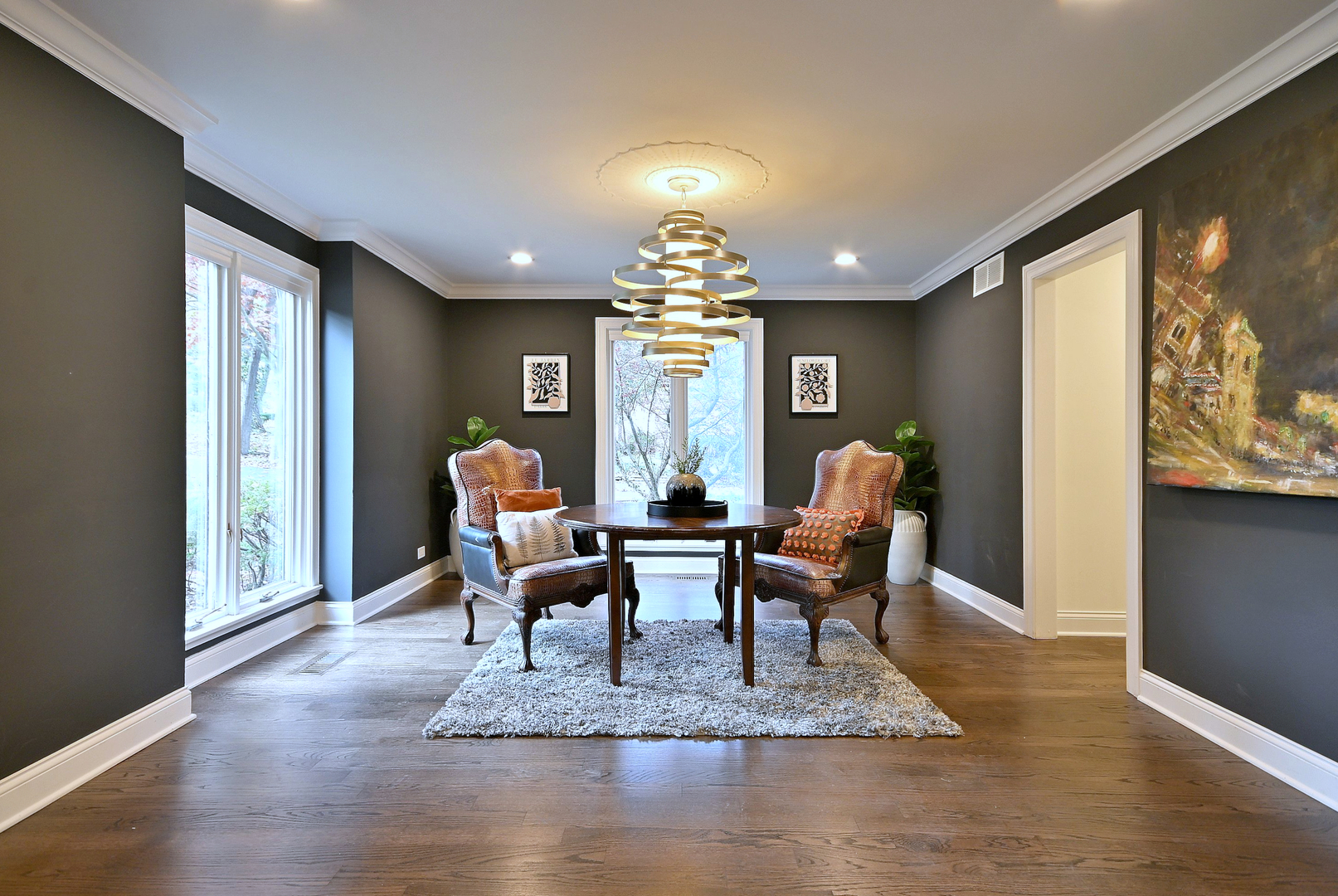 13 Woodgate Drive Burr Ridge, IL 60527 - Photo 27 of 46 a living room with furniture a chandelier and a large window
