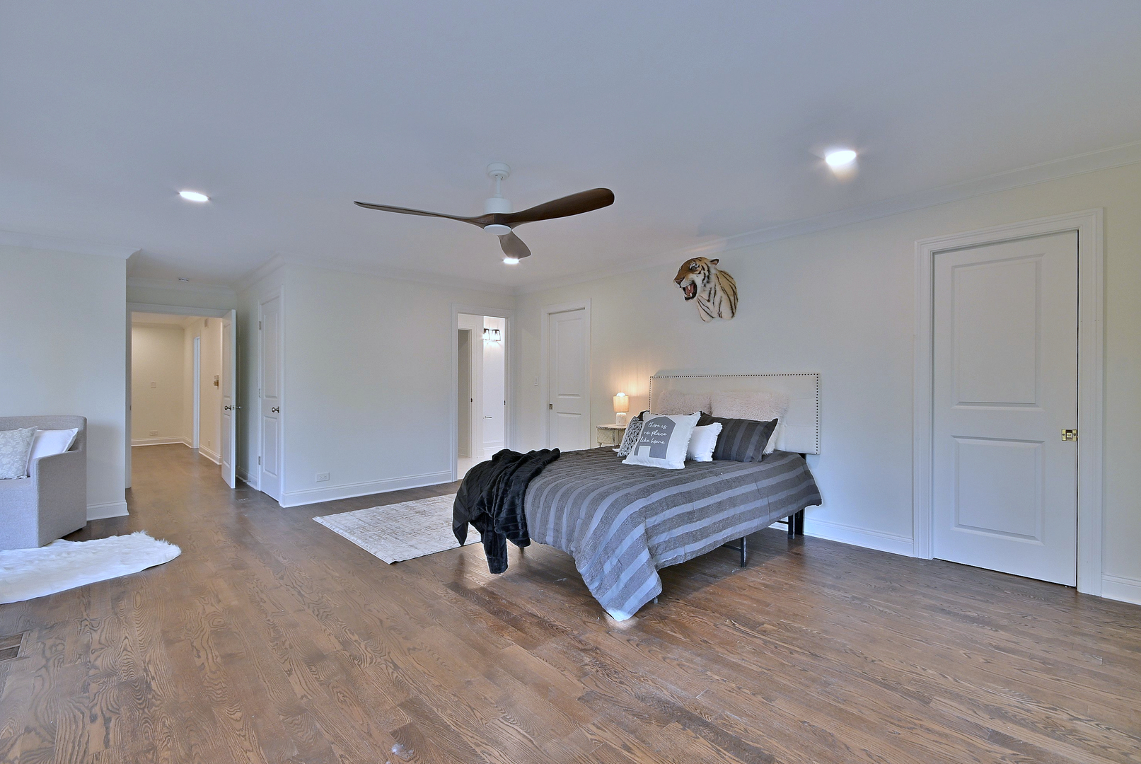 13 Woodgate Drive Burr Ridge, IL 60527 - Photo 34 of 46 a bedroom with a bed and a lamp