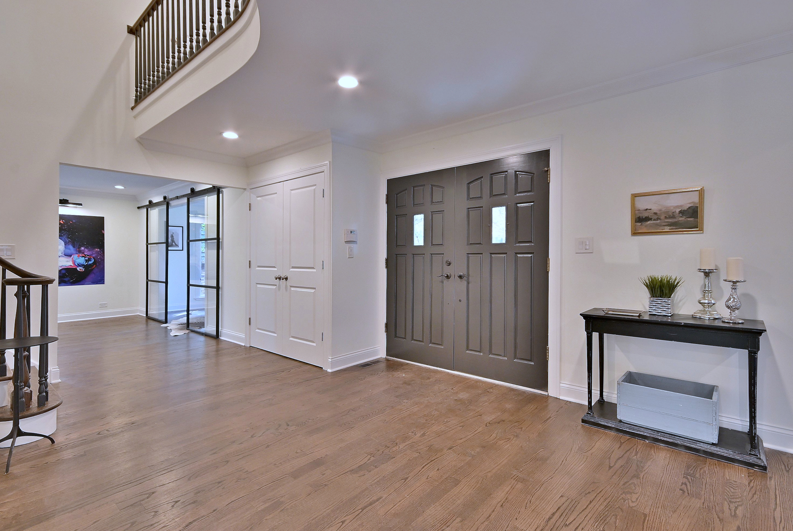 13 Woodgate Drive Burr Ridge, IL 60527 - Photo 5 of 46 a view of an empty room with wooden floor and a cabinet