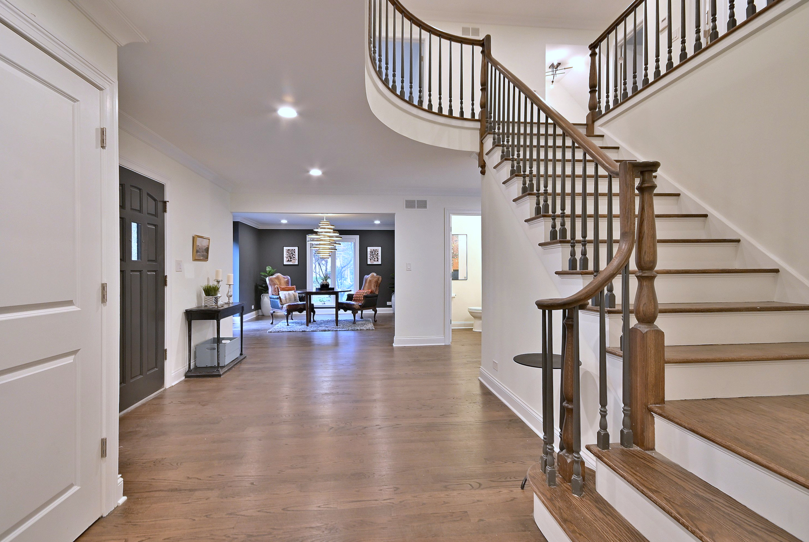 13 Woodgate Drive Burr Ridge, IL 60527 - Photo 7 of 46 a view of entryway livingroom and hall with wooden floor