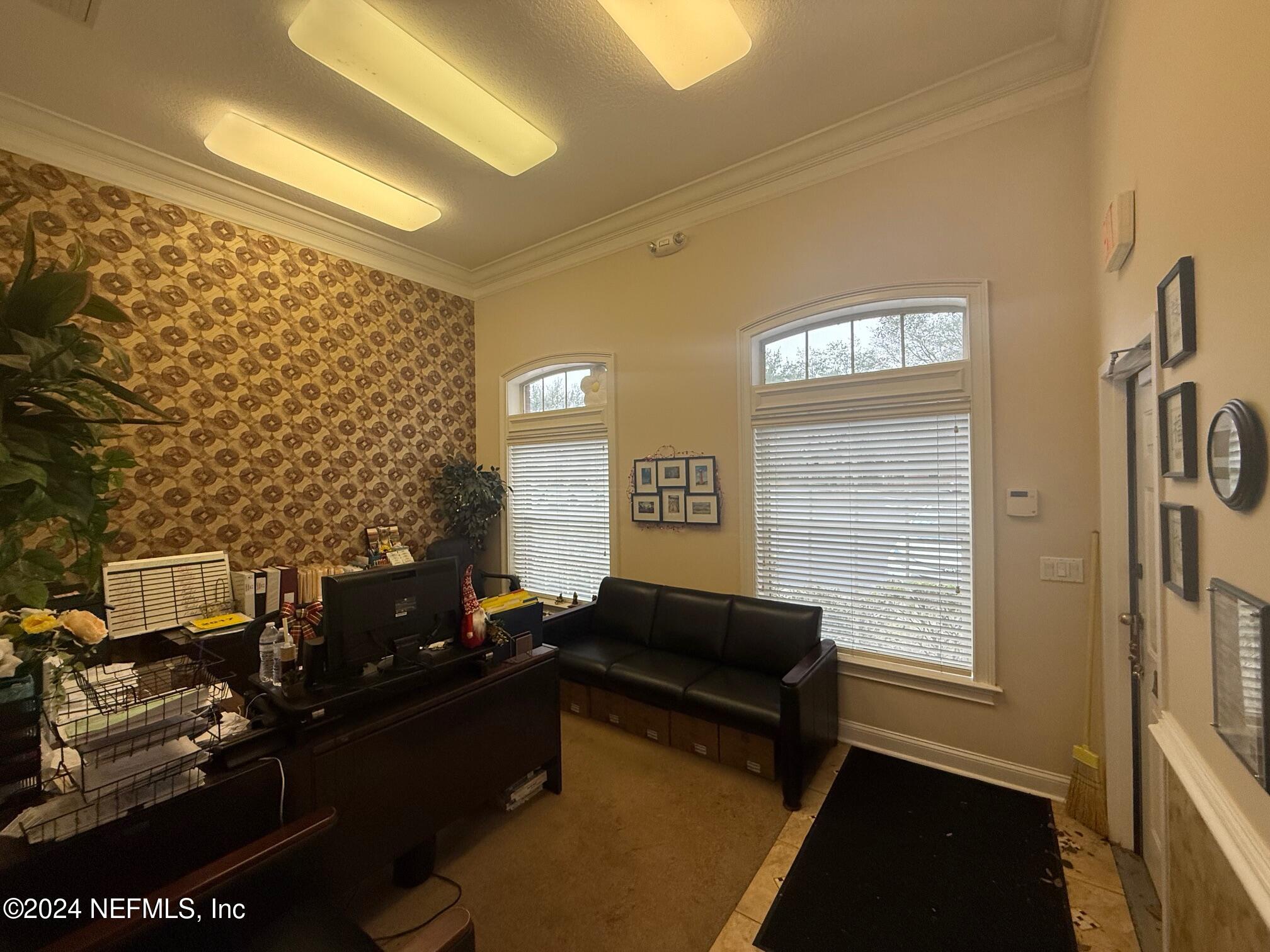 9310 Old Kings Road South, Unit 1101 Jacksonville, FL 32257 - Photo 3 of 13 a living room with furniture