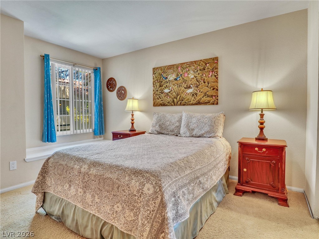 3145 East Flamingo Road, Unit 2129 Las Vegas, NV 89121 - Photo 22 of 43 A window seat offers a pleasant spot to unwind in this restful bedroom.