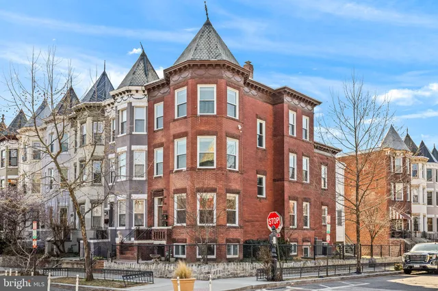 a front view of a building and a street