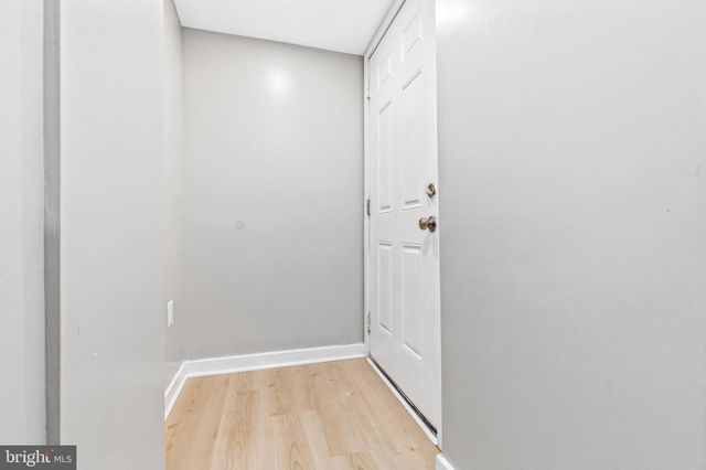 a picture of a room that has a window in it