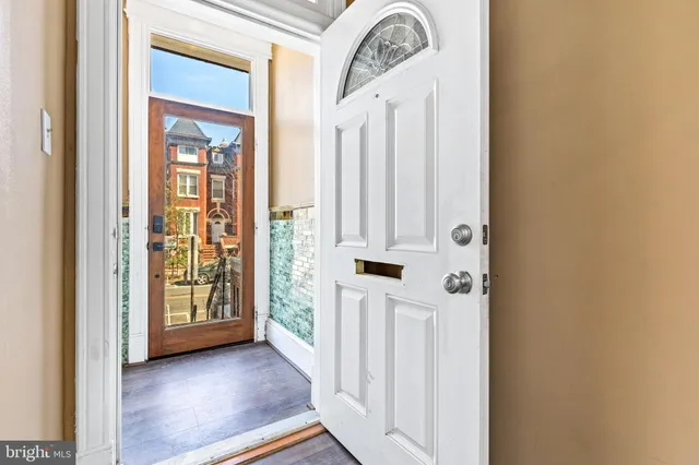 a living room with furniture fireplace and flat screen tv