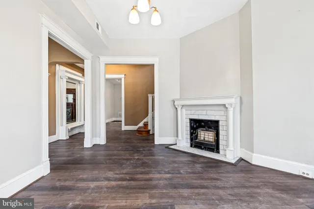 a kitchen with stainless steel appliances granite countertop a sink a stove and cabinets