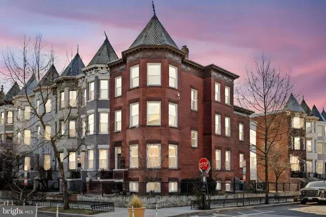 a front view of a building and a street