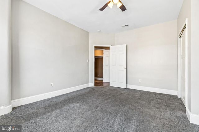 a view of a room that has a window in it