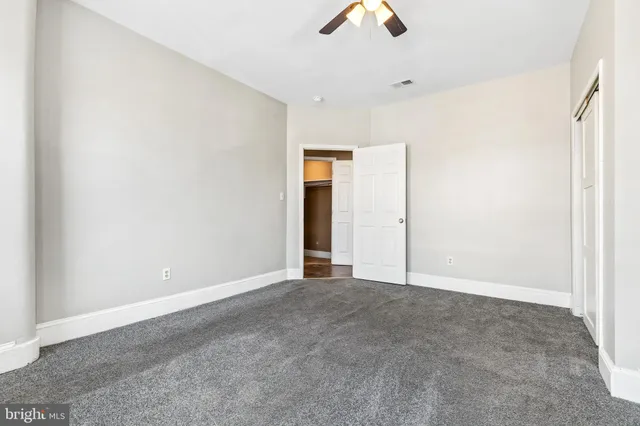 a view of a room that has a window in it