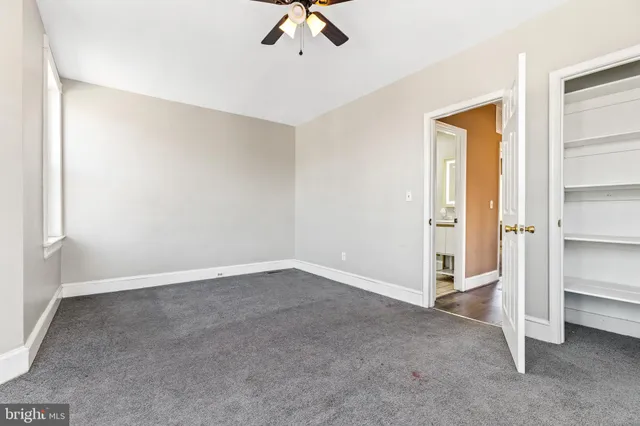 a view of an empty room with window